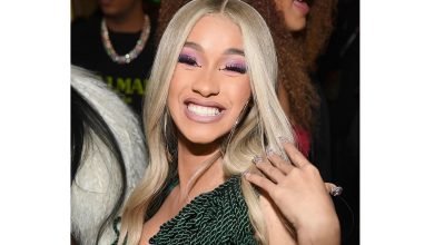 Cardi B's smile before fixed