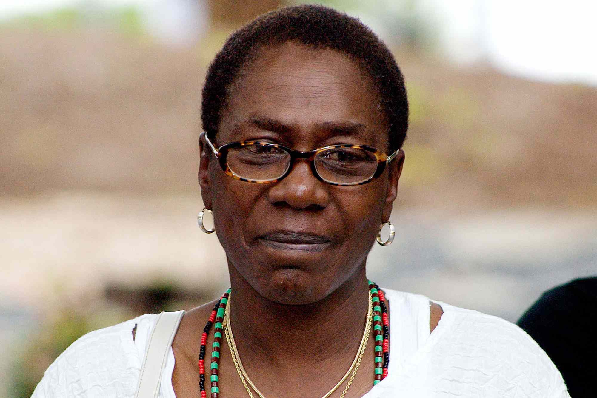 STONE MOUNTAIN, GA - SEPTEMBER 09: Afeni Shakur-Davis, mother of the late Tupac Shakur, watches an African drum ceremony on September 9, 2006 in Stone Mountain, Georgia. (Photo by Annette Brown/Getty Images)