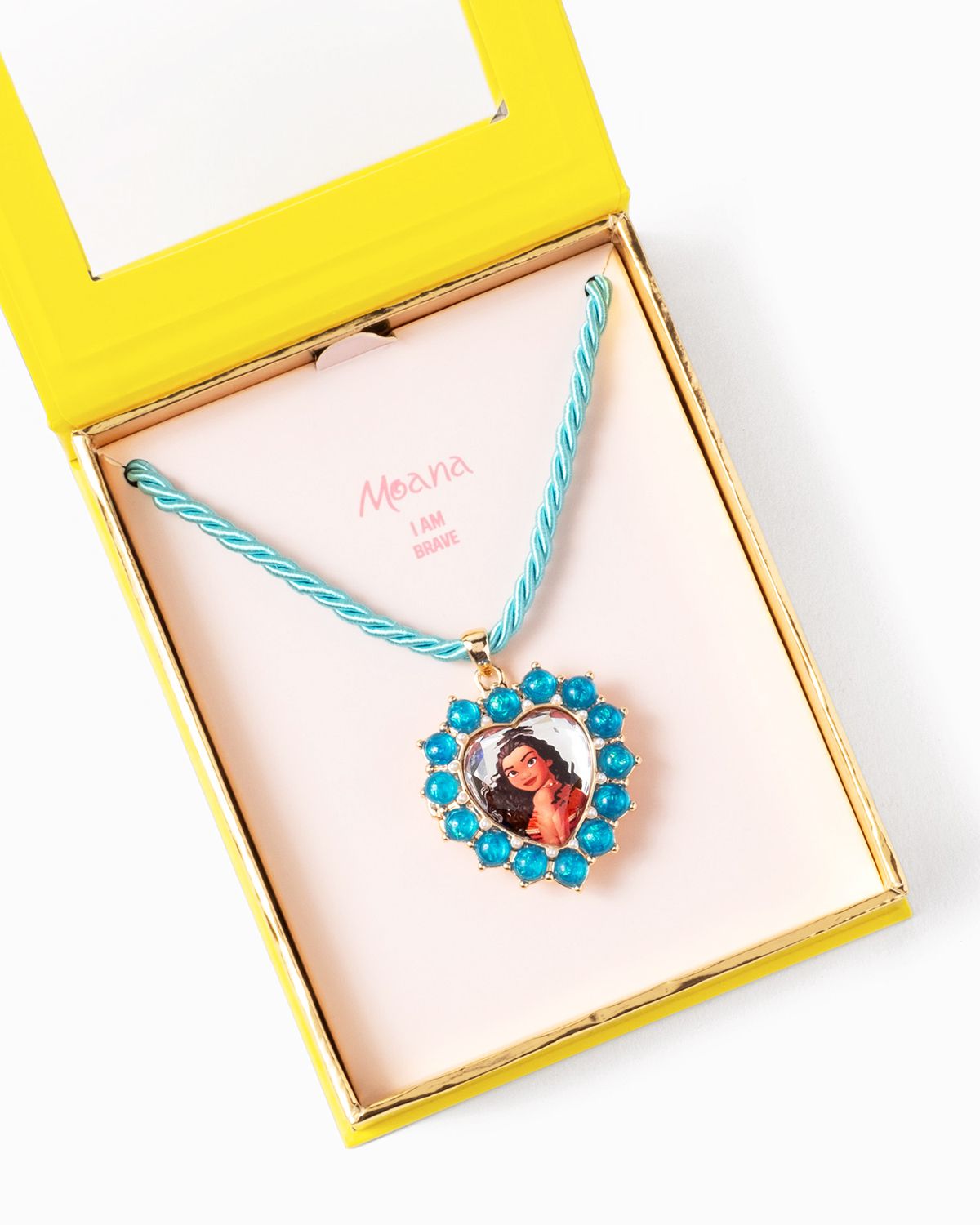 Disney Moana Cameo Locket Necklace opens to reveal the affirmation I Am Brave