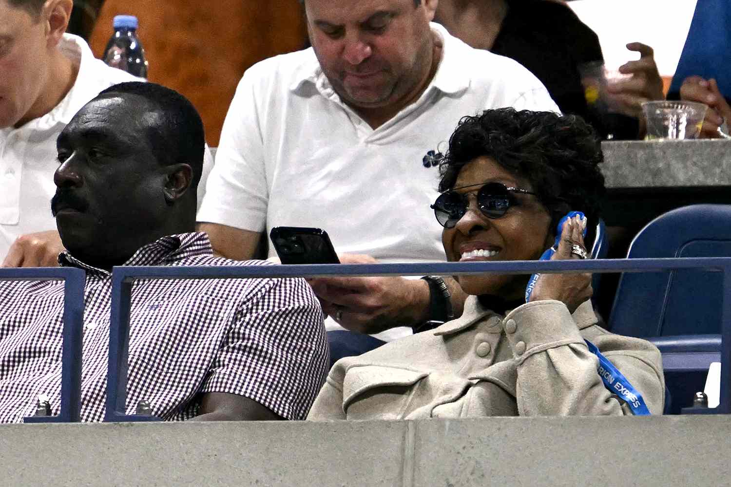 US singer Gladys Knight (R) attends the women's singles round of 16 match between Poland's Iga Swiatek and Russia's Liudmila Samsonova on day eight of the US Open tennis tournament at the USTA Billie Jean King National Tennis Center in New York City, on September 2, 2024. 