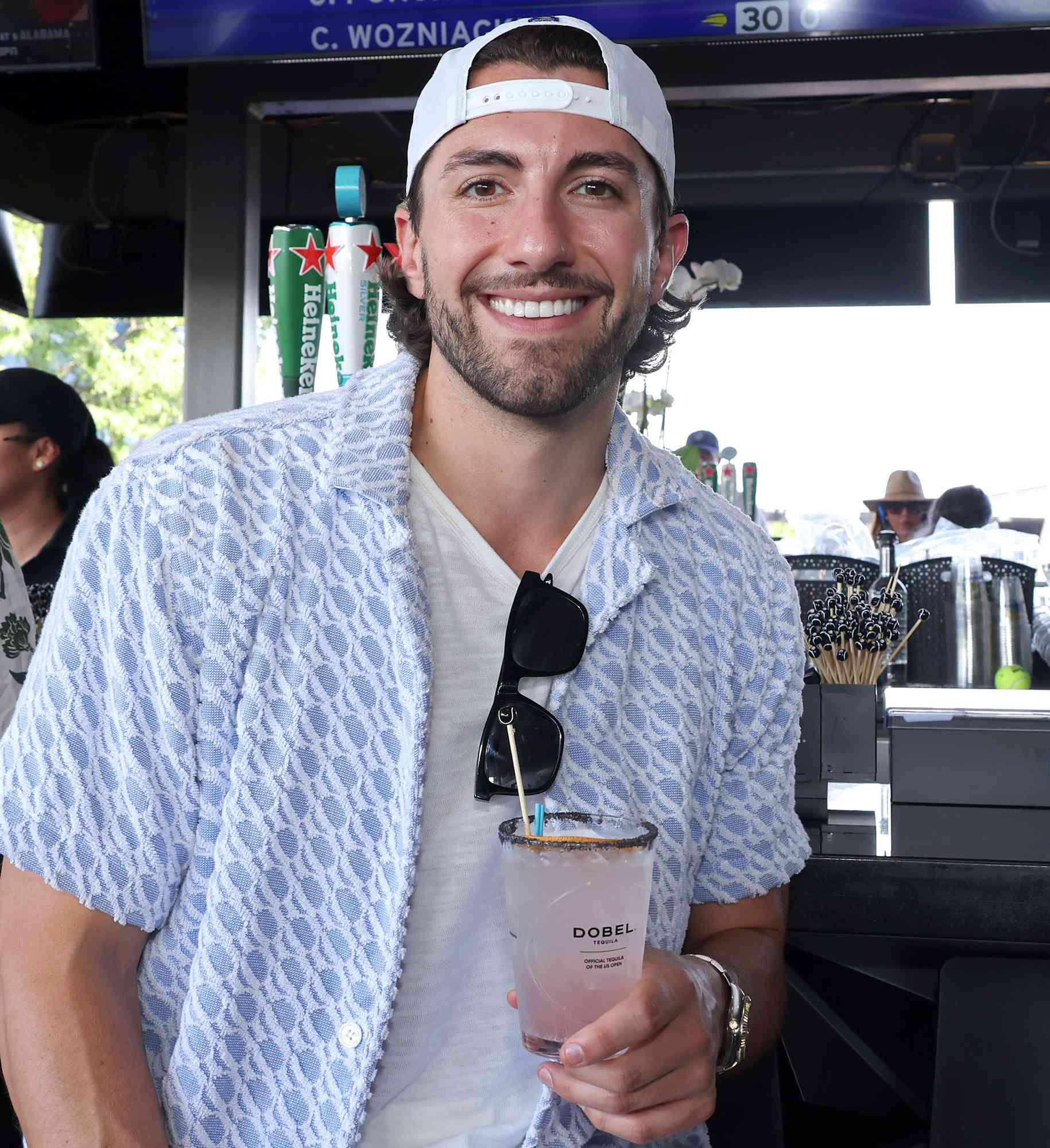 Jason Tartick enjoys a Dobel Tequila Ace Paloma at the Dobel Tequila Club at the 2024 US Open on August 31, 2024 in New York City. 