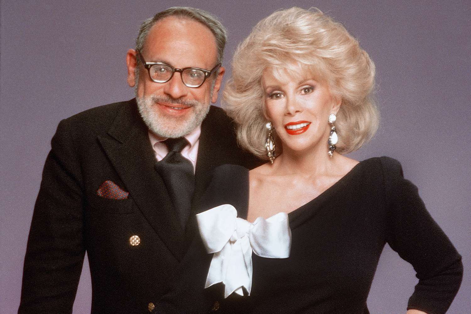 Comedian Joan Rivers and husband Edgar Rosenberg pose for a portrait in 1987 in Los Angeles, California. 