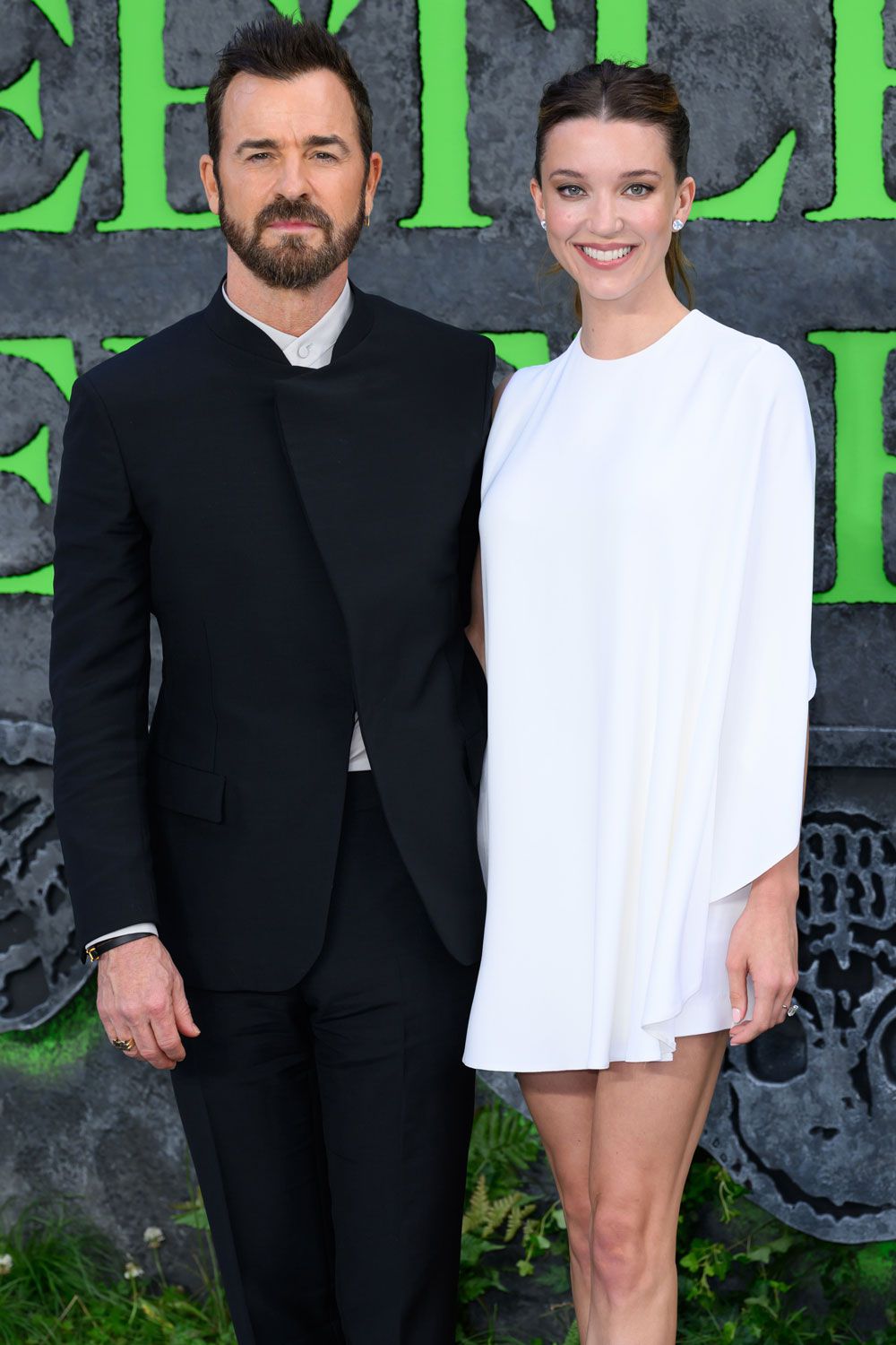 Justin Theroux and Nicole Brydon Bloom attend the UK Premiere of "Beetlejuice Beetlejuice" at the Cineworld Leicester Square on August 29, 2024