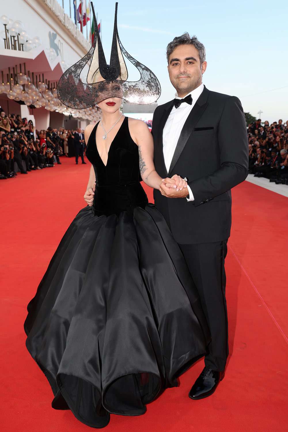 Lady Gaga and Michael Polansky attend the "Joker: Folie Ã  Deux" red carpet during the 81st Venice International Film Festival at Sala Grande on September 04, 2024