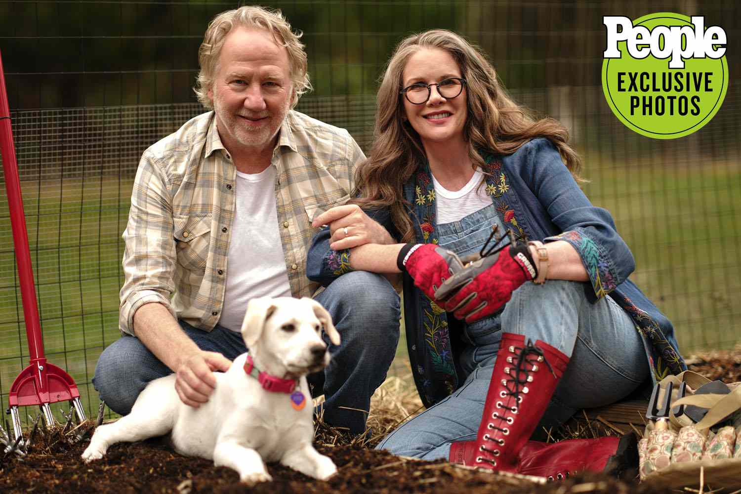 Melissa Gilbert & husband Timothy Busfield photographed at home in Highland Park NY , by George Holz ; April 21 2022 Hair & Makeup : Michelle Coursey Stylist: Jennifer Greene Shot #1 (Garden) MG: Overalls by DL1962 Kimono by Johnny Was T-shirt by James Perse Boots, modelâs own TB: Plaid shirt by Eleventy Milano T-shirt by James Perse Jeans and boots, modelâs own