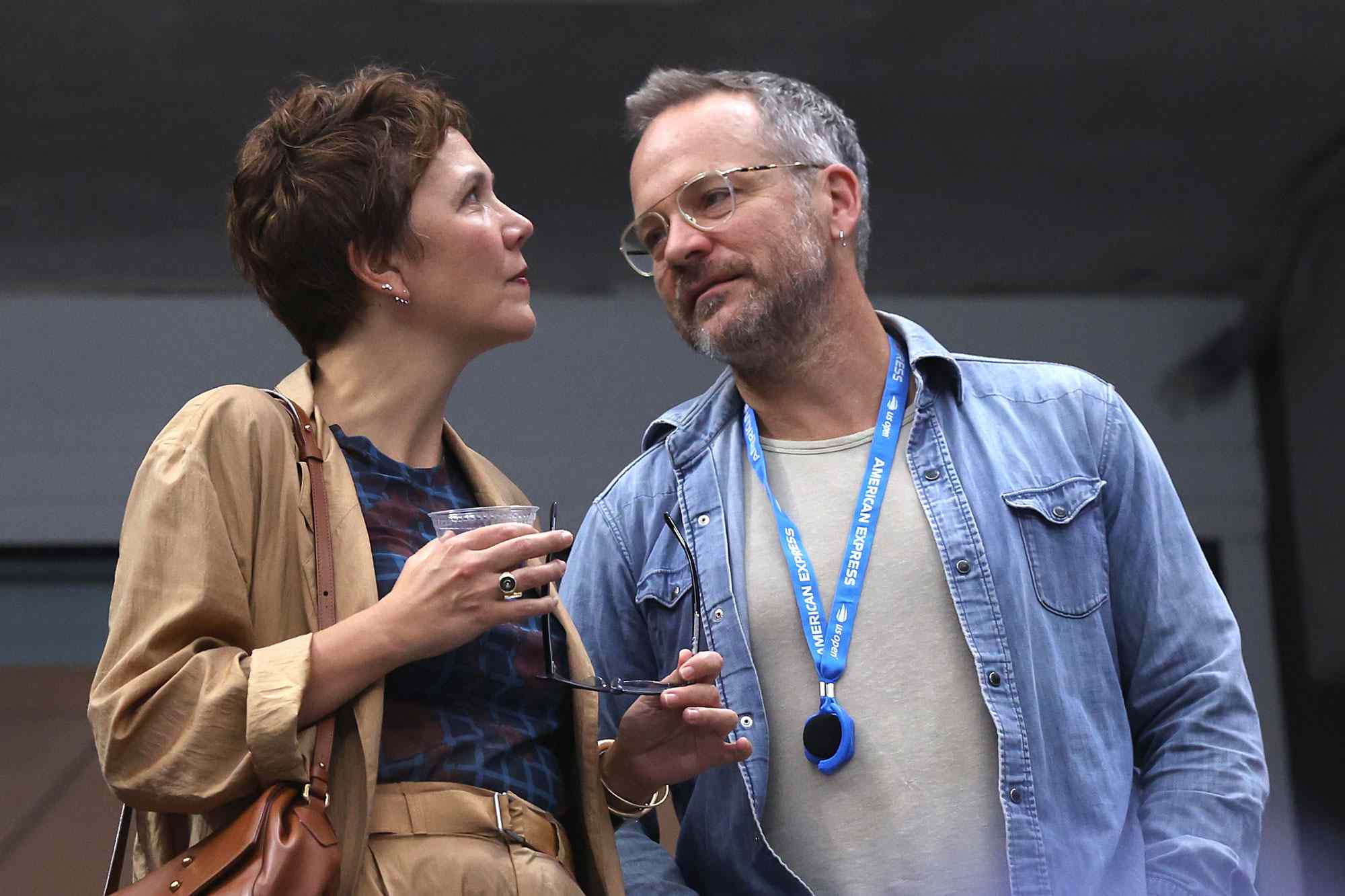 Maggie Gyllenhaal and Peter Sarsgaard attend the Women's Singles Final match between Aryna Sabalenka of Belarus and Jessica Pegula of the United States on Day Thirteen of the 2024 US Open at USTA Billie Jean King National Tennis Center on September 07, 2024