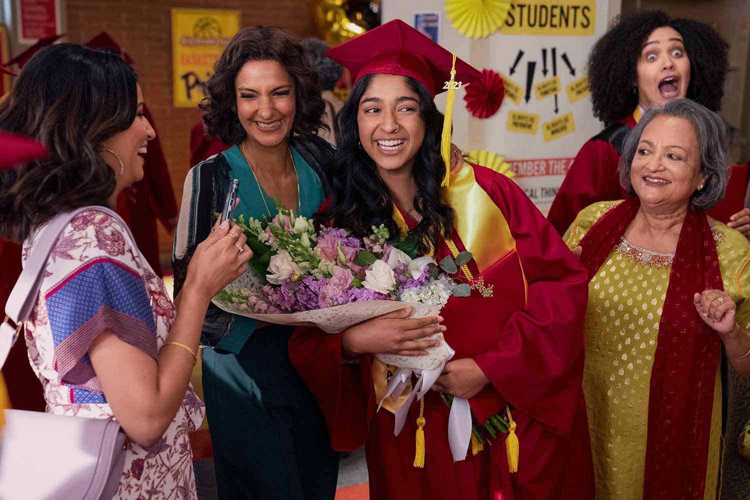 Never Have I Ever. (L to R) Richa Moorjani as Kamala, Poorna Jagannathan as Nalini Vishwakumar, Maitreyi Ramakrishnan as Devi, Ranjita Chakravarty as Nirmala, Lee Rodriguez as Fabiola Torres in episode 410 of Never Have I Ever. Cr. Lara Solanki/Netflix Â© 2023