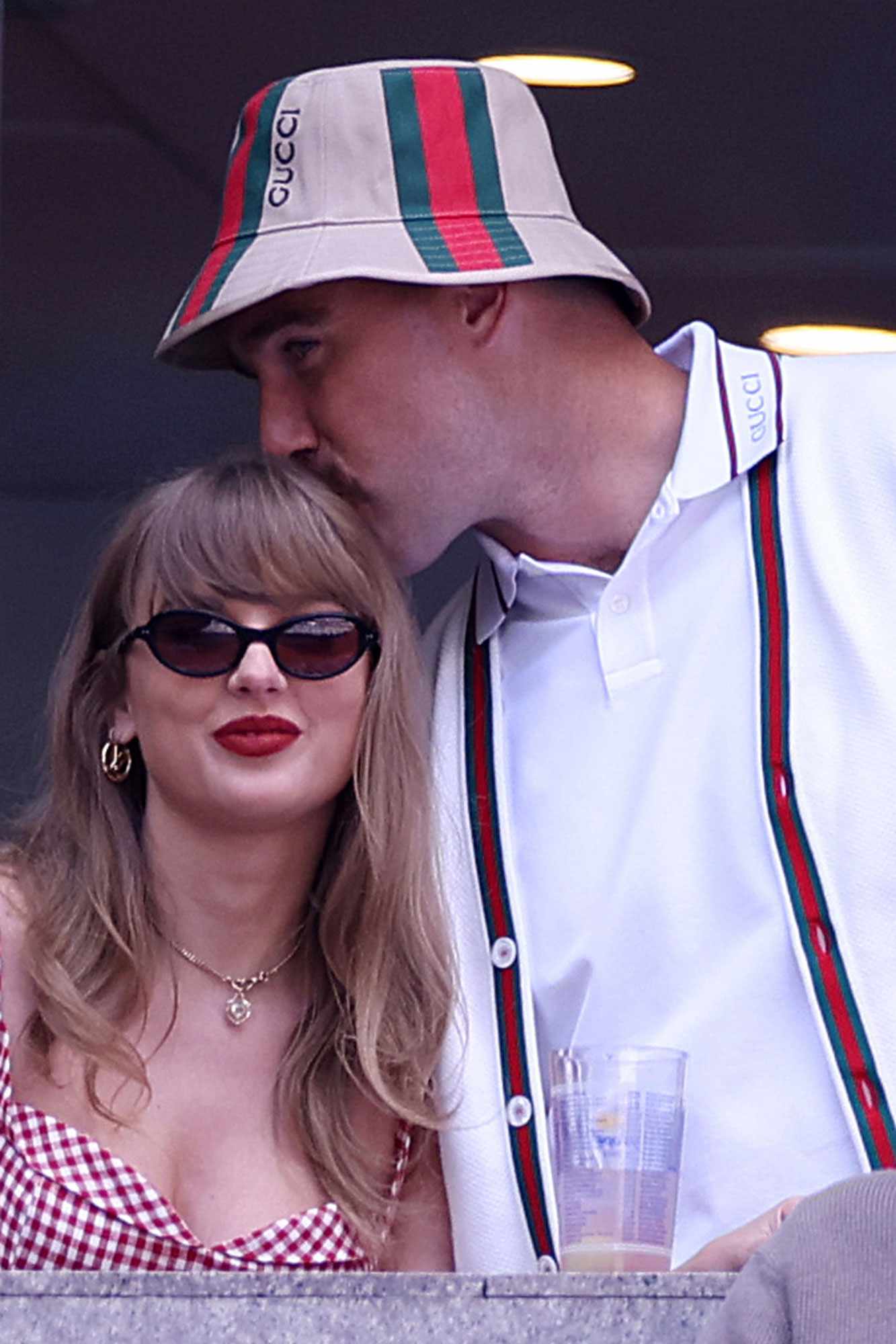 Singer-songwriter Taylor Swift and Travis Kelce of the Kansas City Chiefs attend the Men's Singles Final match between Taylor Fritz of the United States and Jannik Sinner of Italy on Day Fourteen of the 2024