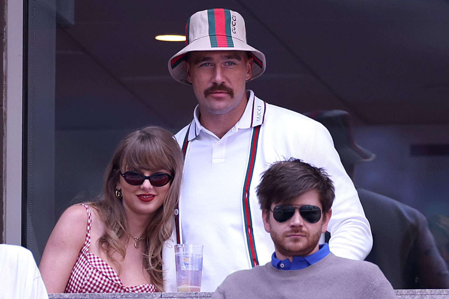 Singer-songwriter Taylor Swift and Travis Kelce of the Kansas City Chiefs attend the Men's Singles Final match between Taylor Fritz of the United States and Jannik Sinner of Italy on Day Fourteen of the 2024