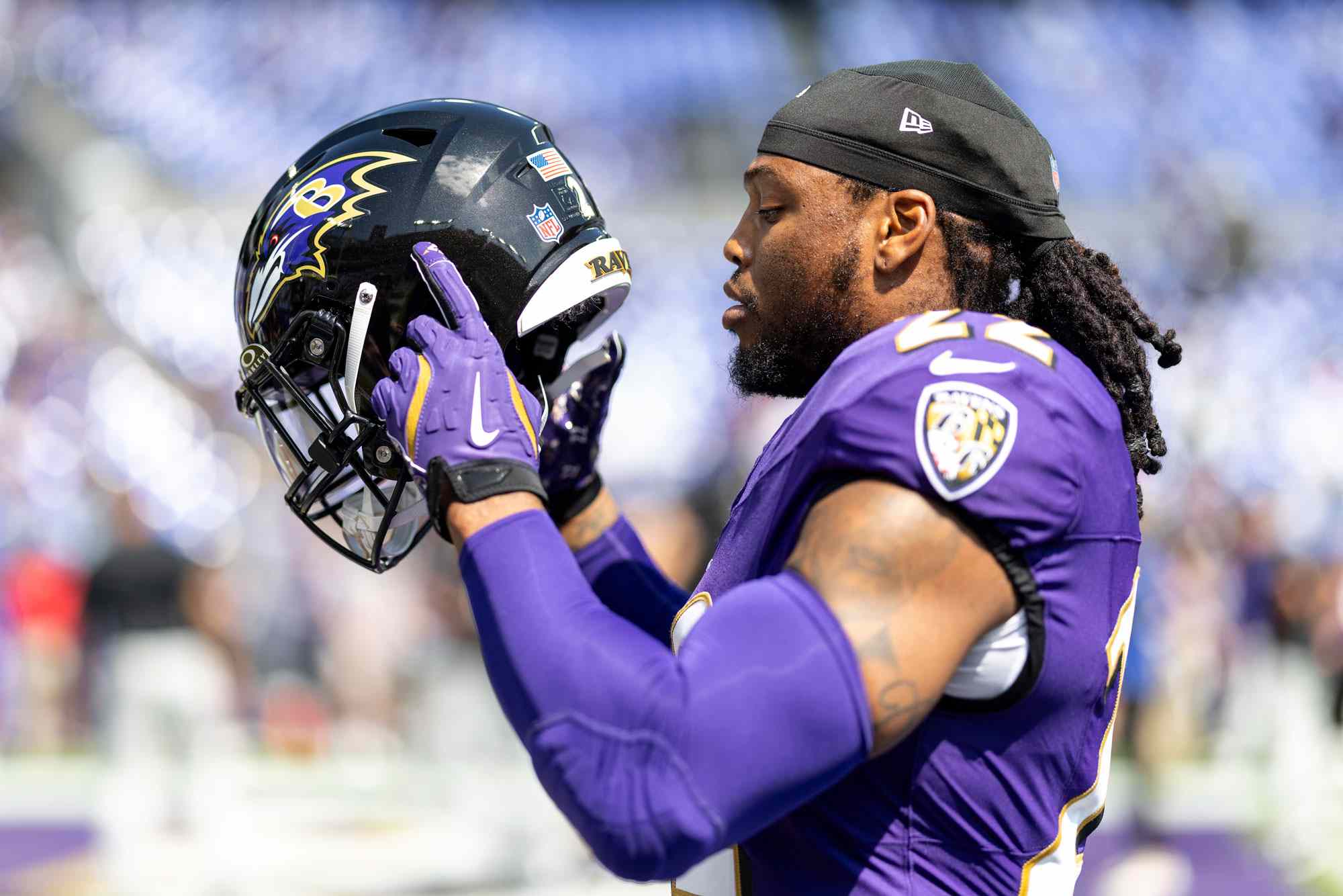 BALTIMORE, MARYLAND - SEPTEMBER 15: Derrick Henry #22 of the Baltimore Ravens puts on his helmet prior to an NFL football game against the Las Vegas Raiders at M&T Bank Stadium on September 15, 2024 in Baltimore, Maryland. (Photo by Michael Owens/Getty Images)