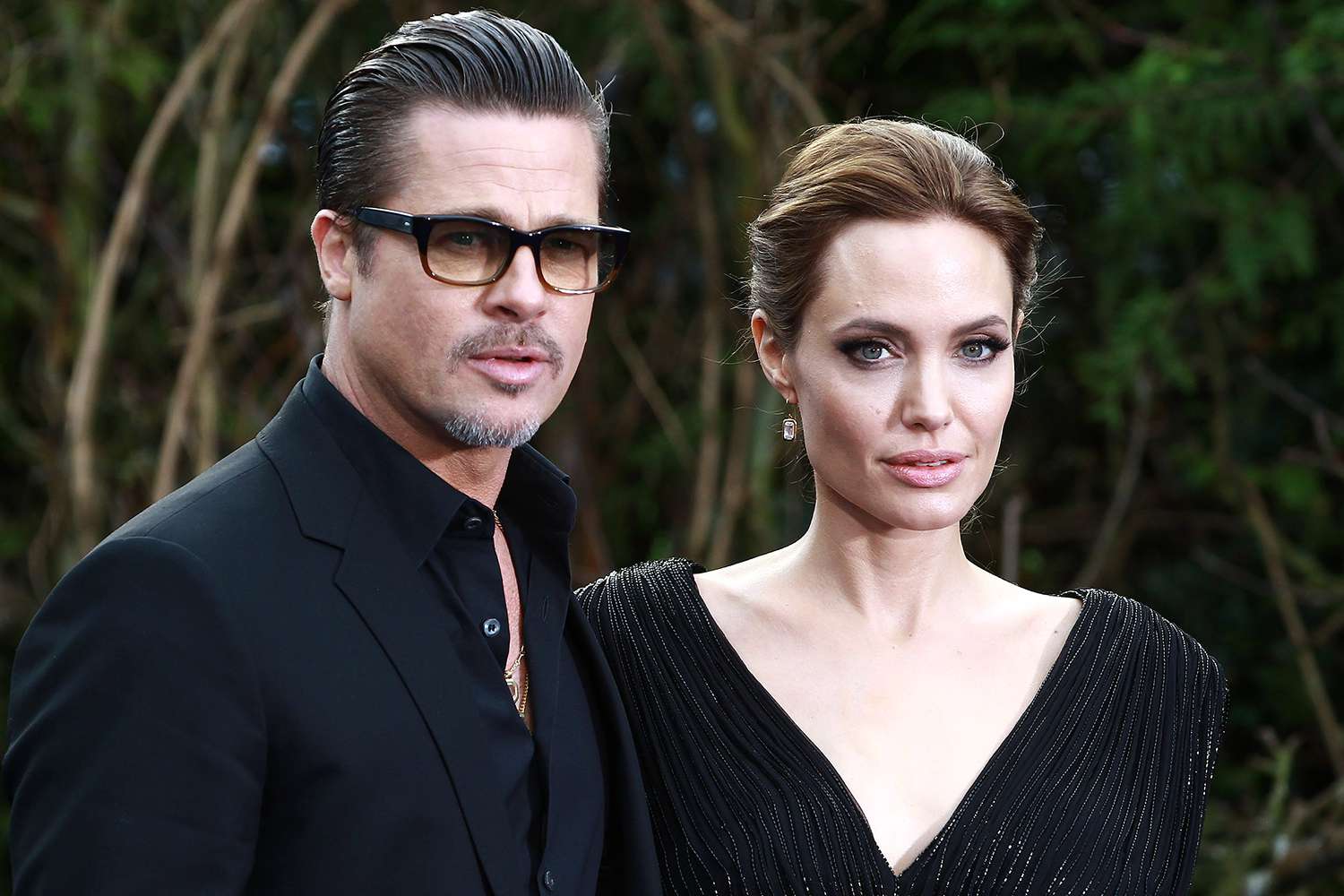 Brad Pitt and Angelina Jolie attend a private reception as costumes and props from Disney's "Maleficent" are exhibited in support of Great Ormond Street Hospital at Kensington Palace on May 8, 2014 in London, England