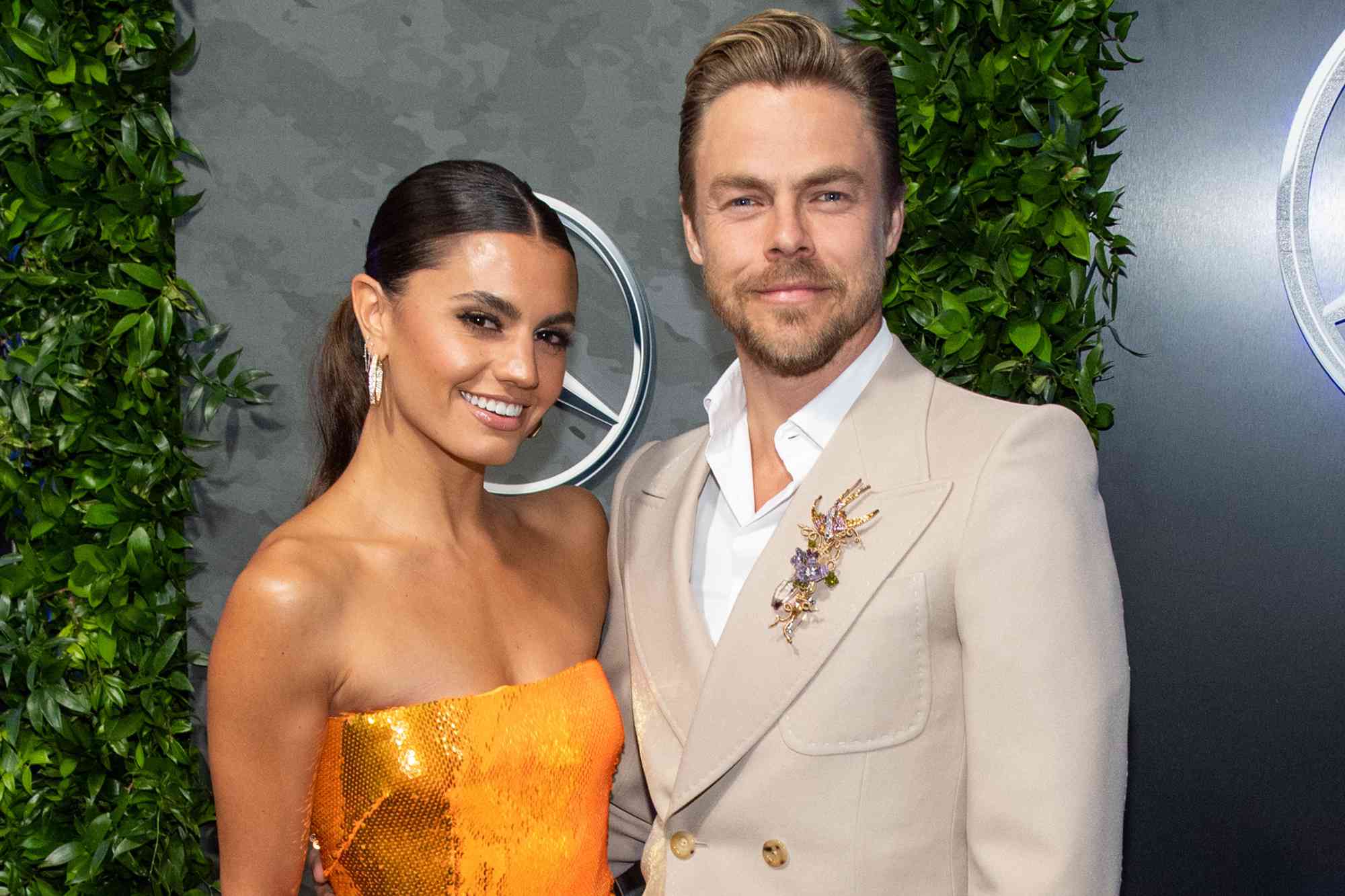 Hayley Erbert and Derek Hough arrive for the Mercedes-Benz Academy Awards viewing party on March 27, 2022 in Los Angeles, California. 