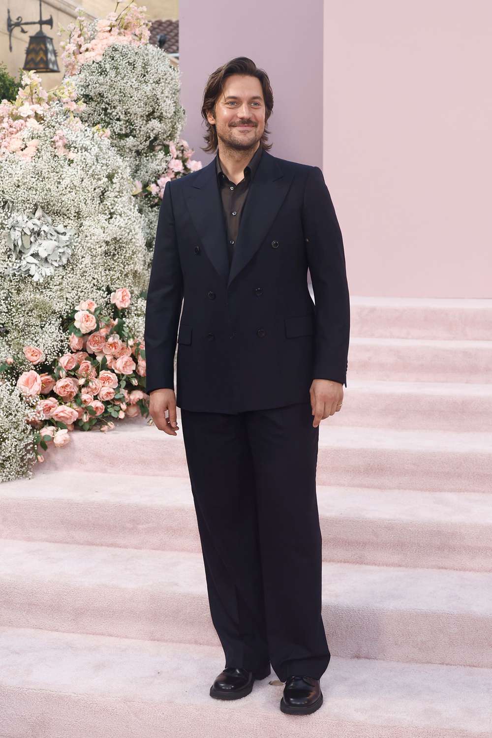 Lucas Bravo attends the Premiere of Netflix's "Emily In Paris" Season 4 Part 1 at The Egyptian Theatre Hollywood on August 14, 2024 in Los Angeles, California. (