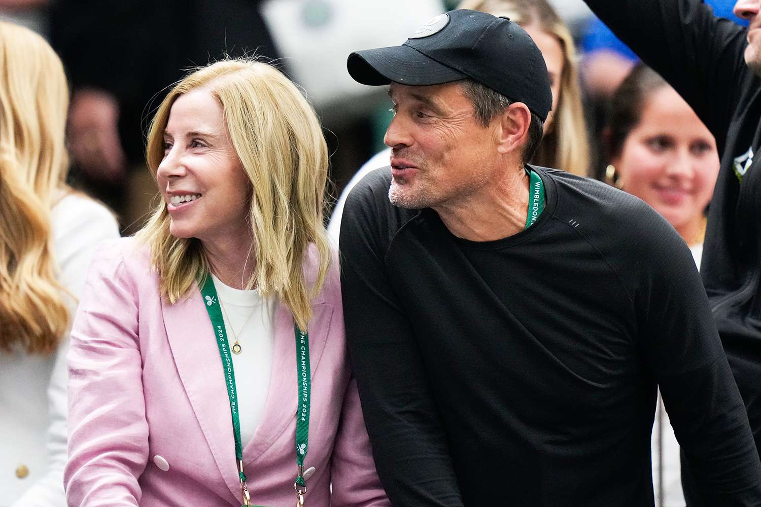 Ben and Kelly Navarro react after their daughter Emma defeated Coco Gauff of the United States in a fourth round match at the Wimbledon tennis championships in London, Sunday, July 7, 2024.