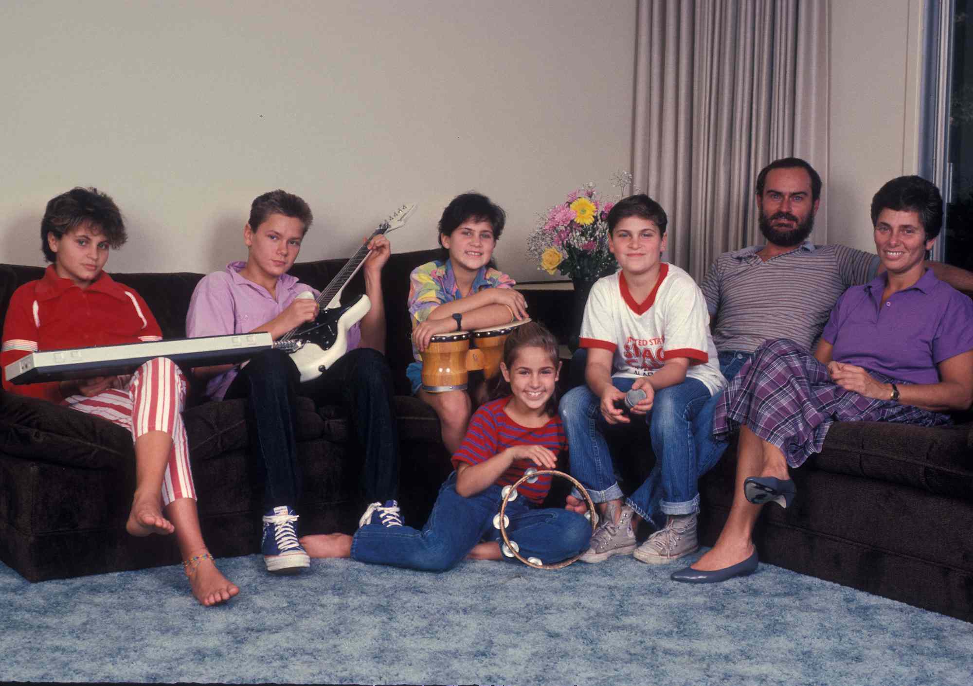 The Phoenix Family relaxing at their home in Los Angeles, California, US, circa 1985.