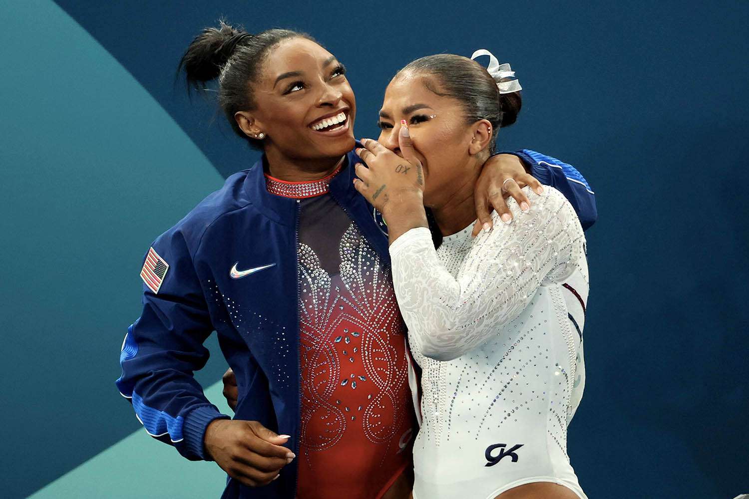 Simone Biles (L) and bronze medalist Jordan Chiles (R) of Team United States celebrate after competing the Artistic Gymnastics Women's Floor Exercise Final 