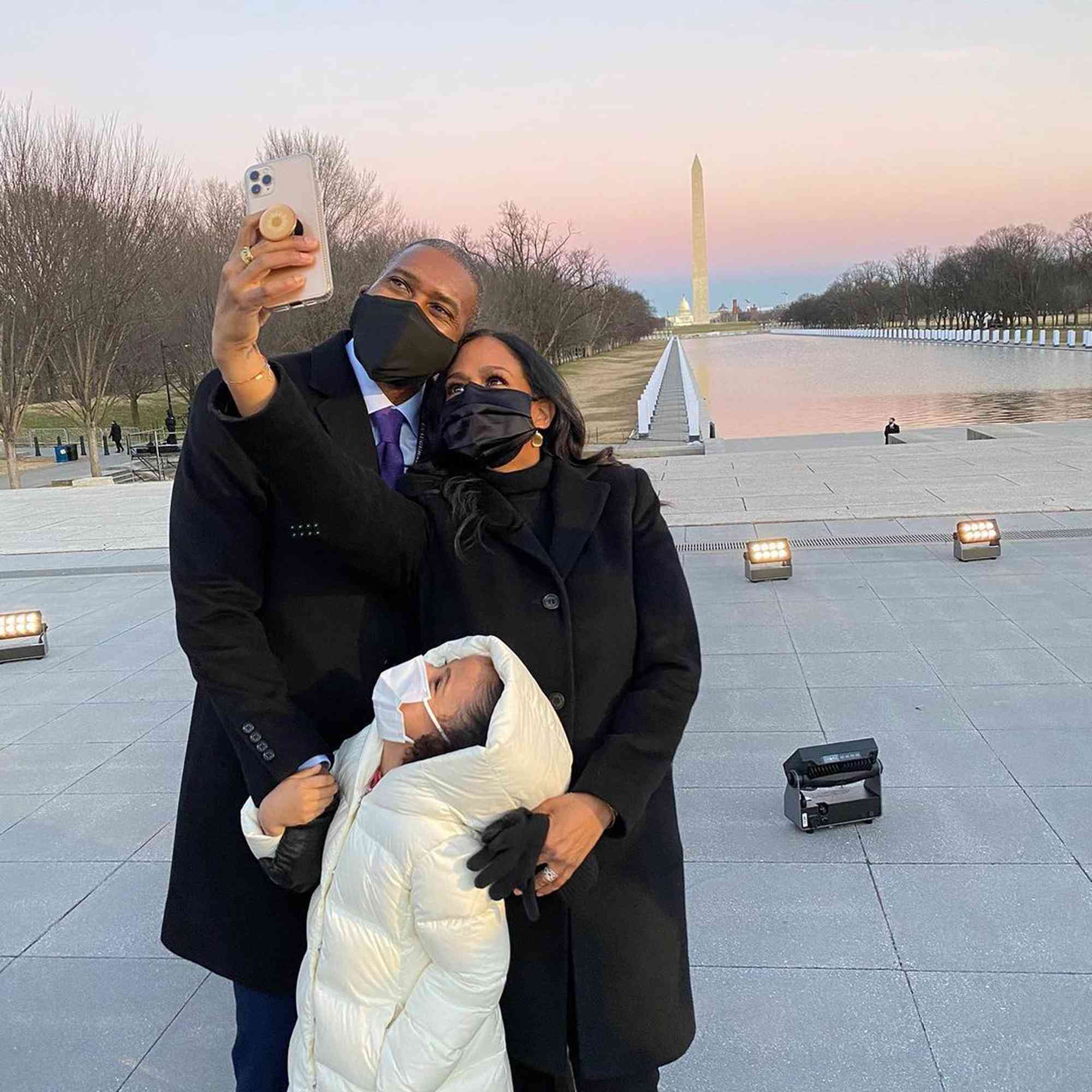 Tony West, Maya Harris, and Amara Ajagu in Washington, DC before the Inaguration in 2021.