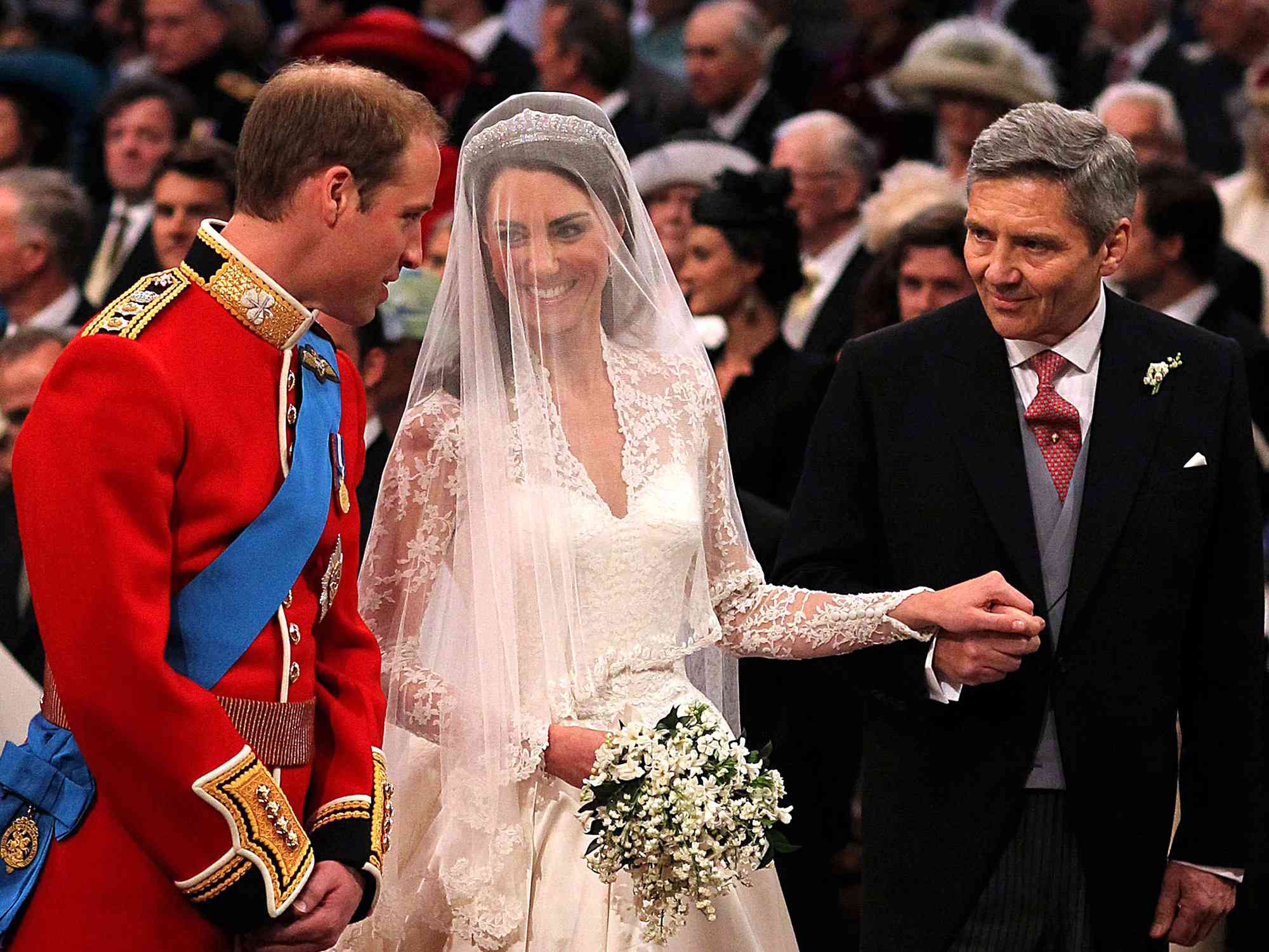 rince William, Catherine Middleton, and her father Michael Middleton at Westminster Abbey during the Royal Wedding in 2011.