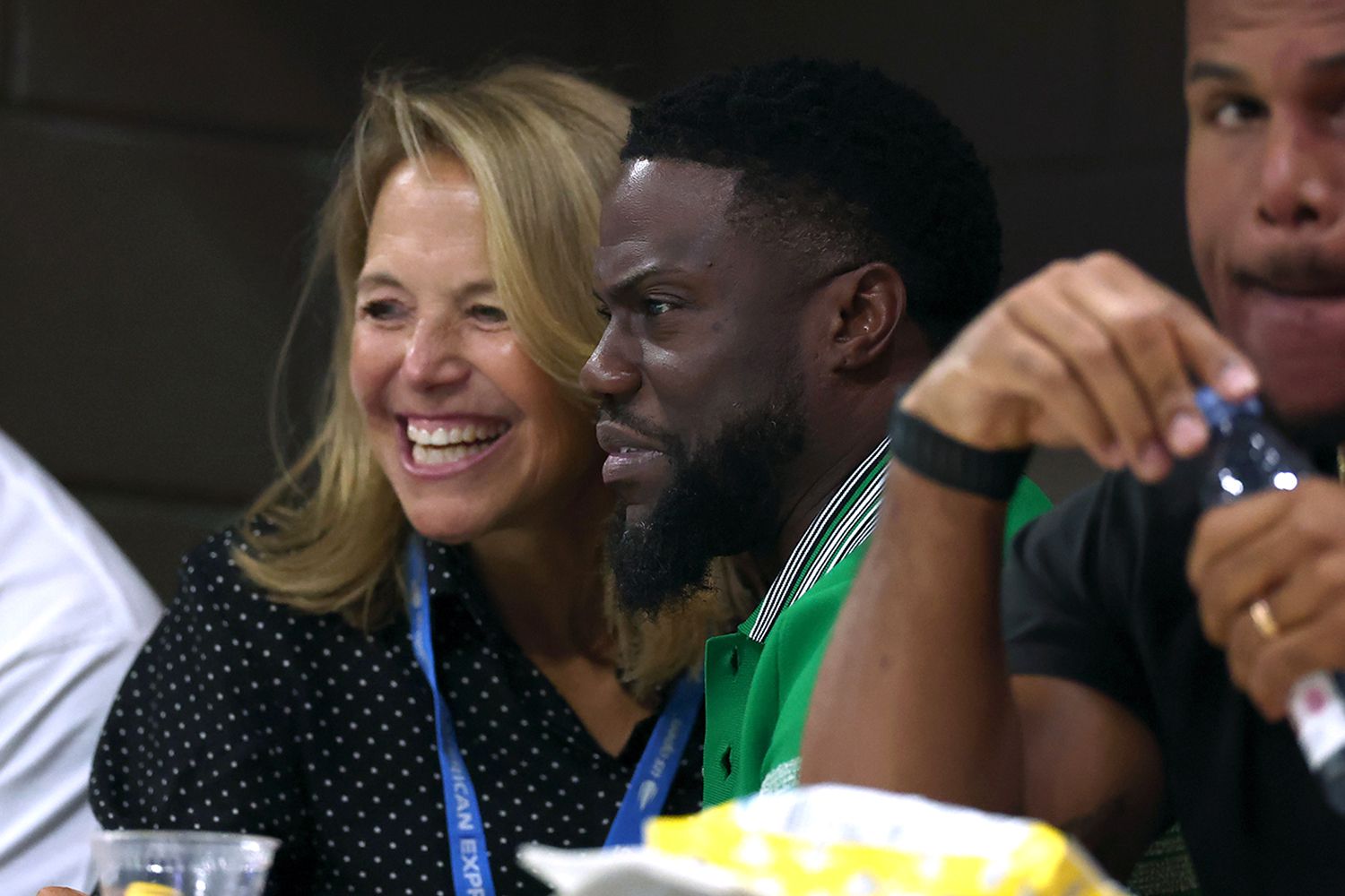 Katie Couric and Kevin Hart during a men's singles quarterfinal match at the 2024 US Open