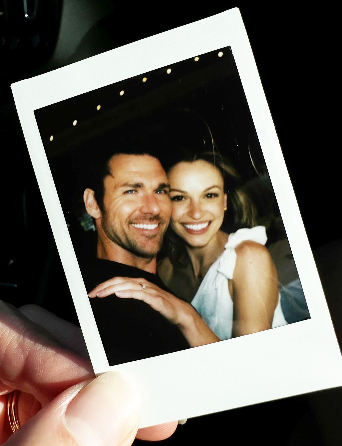 Kayla Wallace and Kevin McGarry pose in polaroid