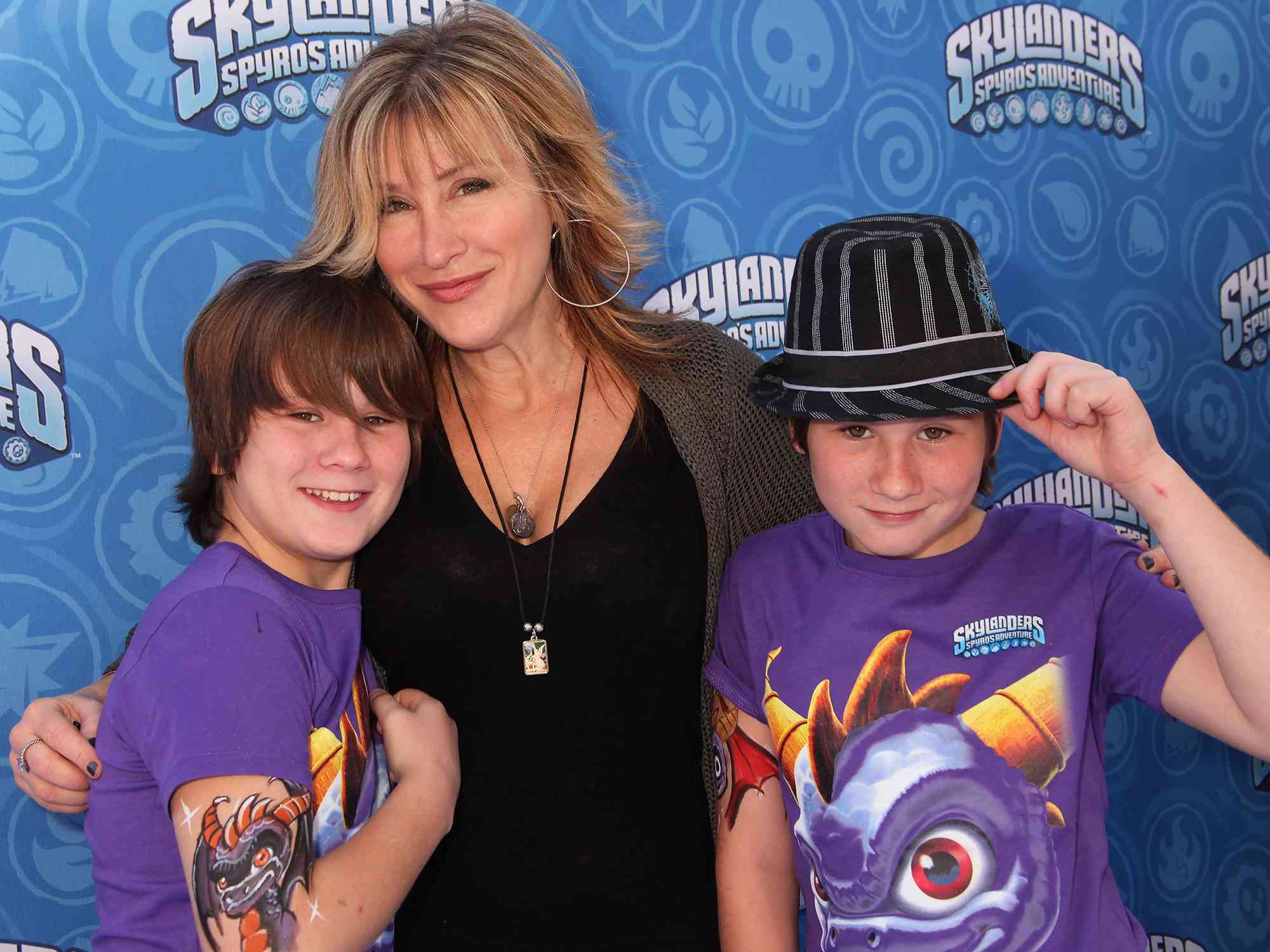 Lisa Ann Walter and sons Spencer and Simon arrive at Skylanderss Spyro's Adventure Halloween Event on October 29, 2011 in Los Angeles, California. 