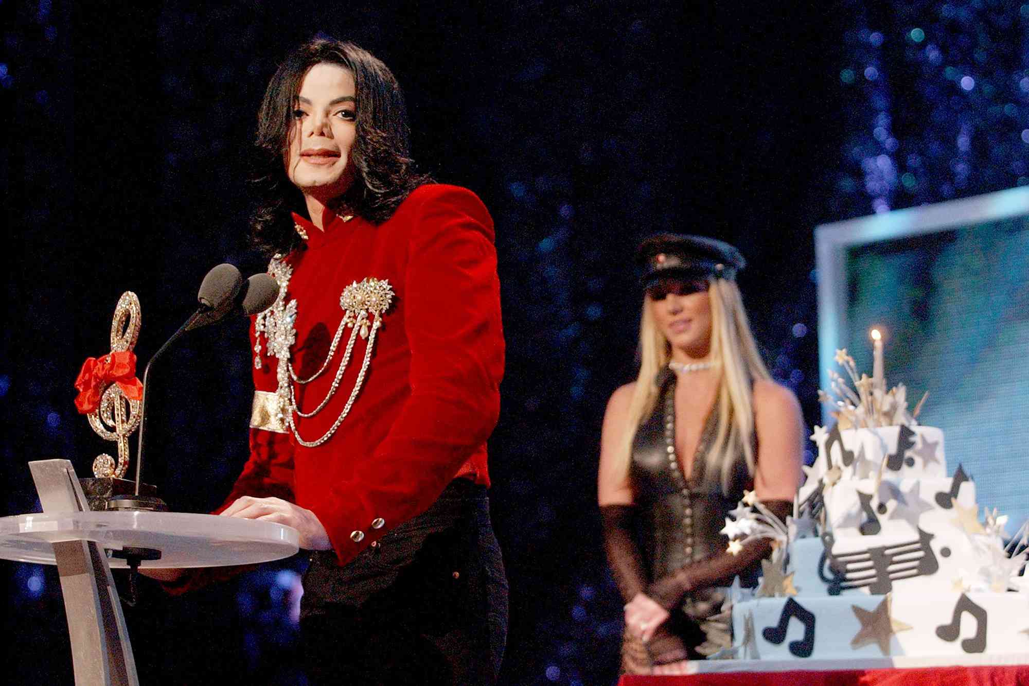 Michael Jackson speaks after Britney Spears presented Michael with a birthday cake at the 2002 MTV Video Music Awards