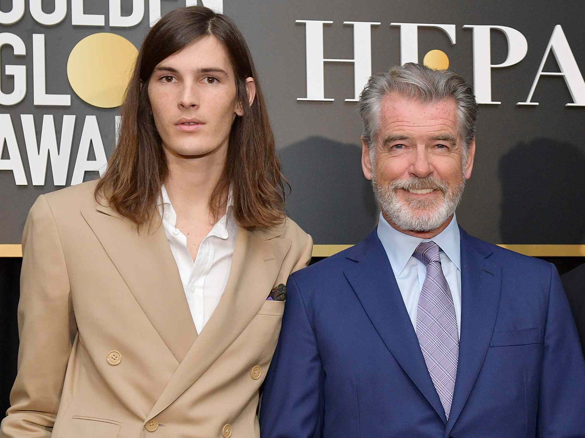 Pierce Brosnan (C) poses with Golden Globe Ambassadors Dylan Brosnan (L) and Paris Brosnan onstage during the Hollywood Foreign Press Association and The Hollywood Reporter Celebration of the 2020 Golden Globe Awards Season and Unveiling of the Golden Globe Ambassadors at Catch on November 14, 2019 in West Hollywood, California