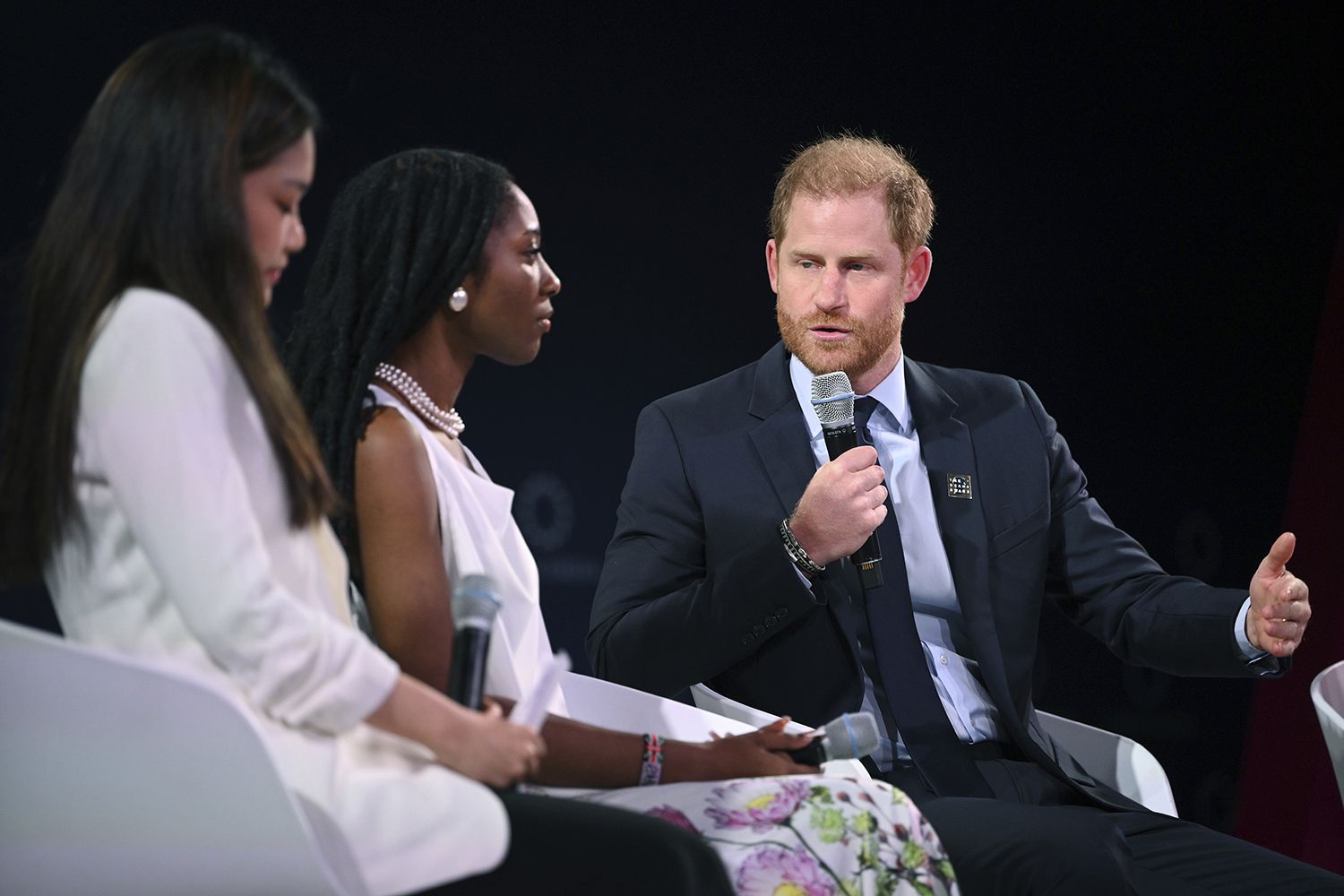 The Diana Award Recipients Chiara Riyanti Hutapea Zhang (Indonesia) and Christian Williams (Jamaica) sit on a panel with Prince Harry, Duke of Sussex as they attend the 2024 Concordia Annual Summit in honor of the Diana Award at the Sheraton Hotel New York Times Square