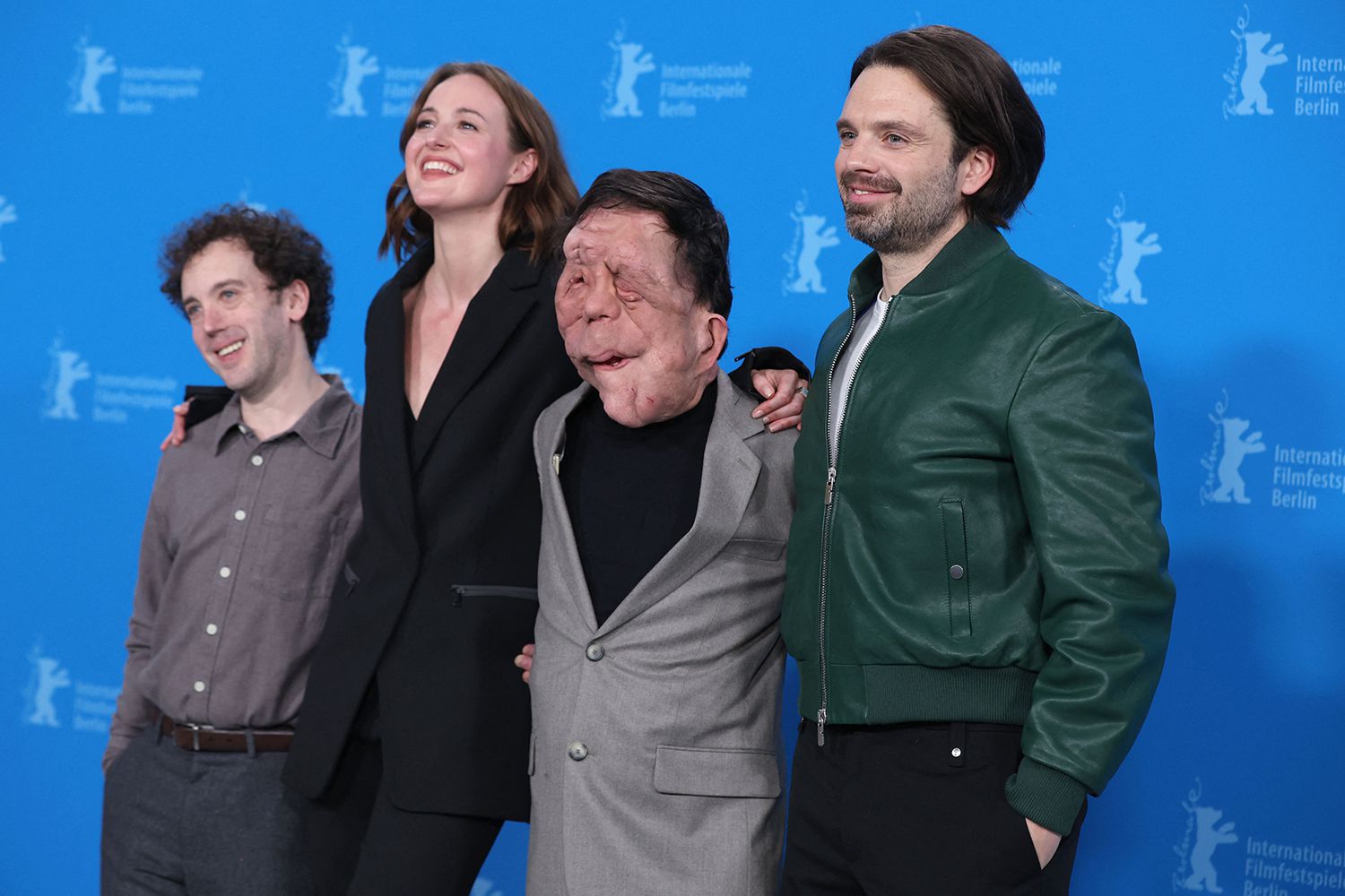 US director Aaron Schimberg, Norwegian actress Renate Reinsve, British actor Adam Pearson and Romanian-US actor Sebastian Stan pose during a photo call for the film 'A Different Man' presented in competition at the 74th Berlinale, Europe's first major film festival of the year, in Berlin on February 16, 2024. 