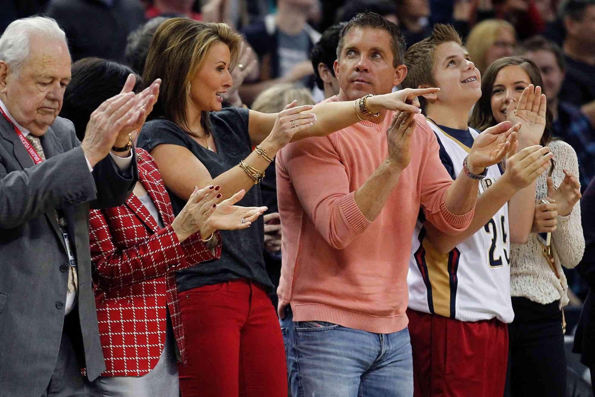 Sean Payton and Skylene Montgomery in the second half of an NBA basketball game against the Portland Trail Blazers in New Orleans on December 30, 2013. 