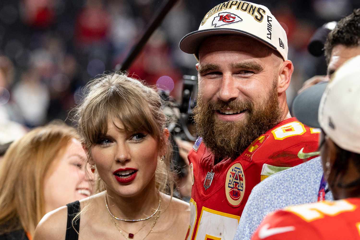 Travis Kelce #87 of the Kansas City Chiefs and Taylor Swift react as they see Mecole Hardman Jr. #12 of the Kansas City Chiefs following the NFL Super Bowl 58 football game between the San Francisco 49ers and the Kansas City Chiefs at Allegiant Stadium on February 11, 2024 in Las Vegas, Nevada