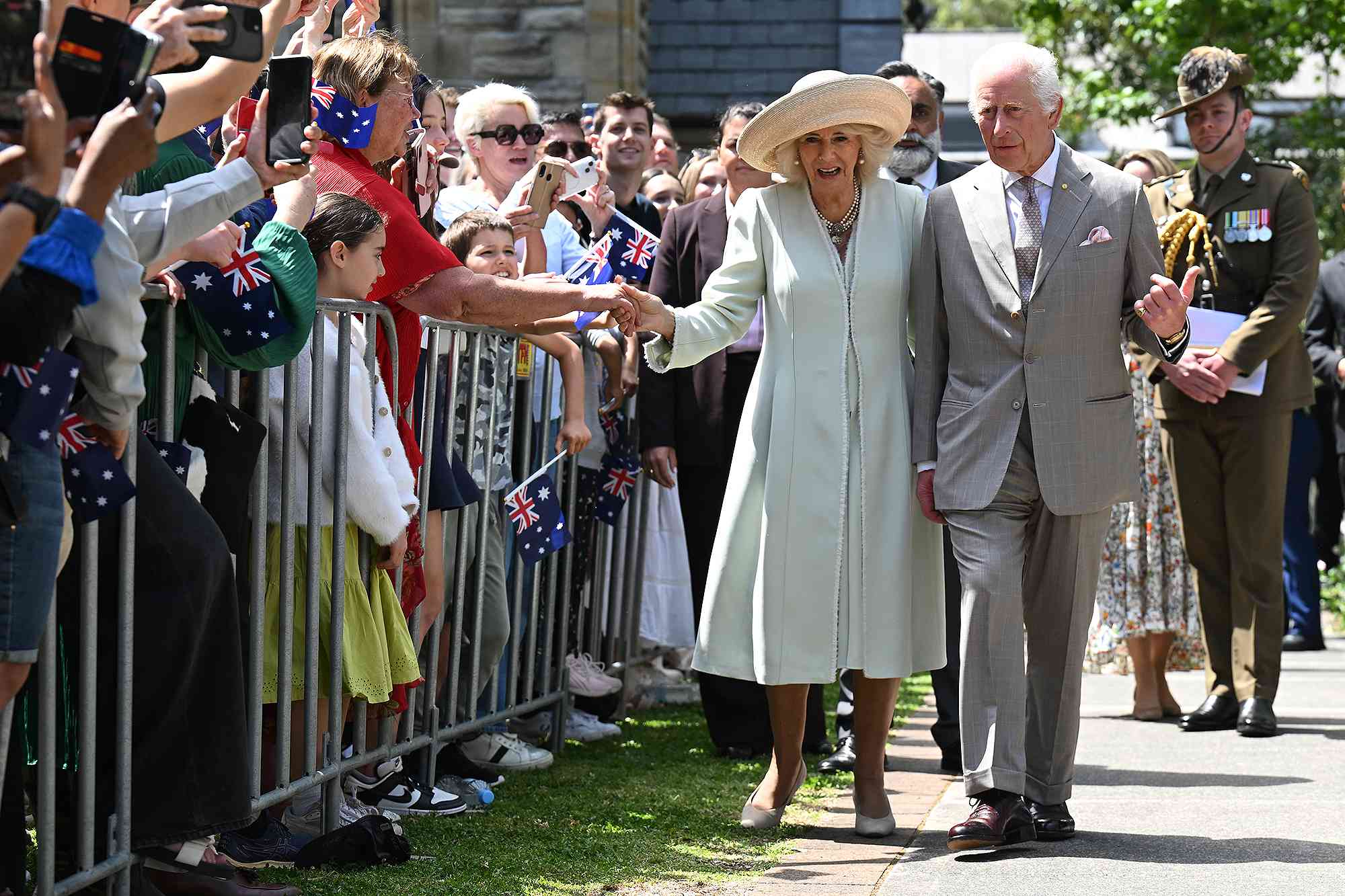 YDNEY, AUSTRALIA - OCTOBER 20: King Charles III and Queen Camilla depart following a service at St. Thomas's Anglican Church on October 20, 2024 in Sydney, Australia. The King's visit to Australia will be his first as Monarch, and CHOGM in Samoa will be his first as Head of the Commonwealth.