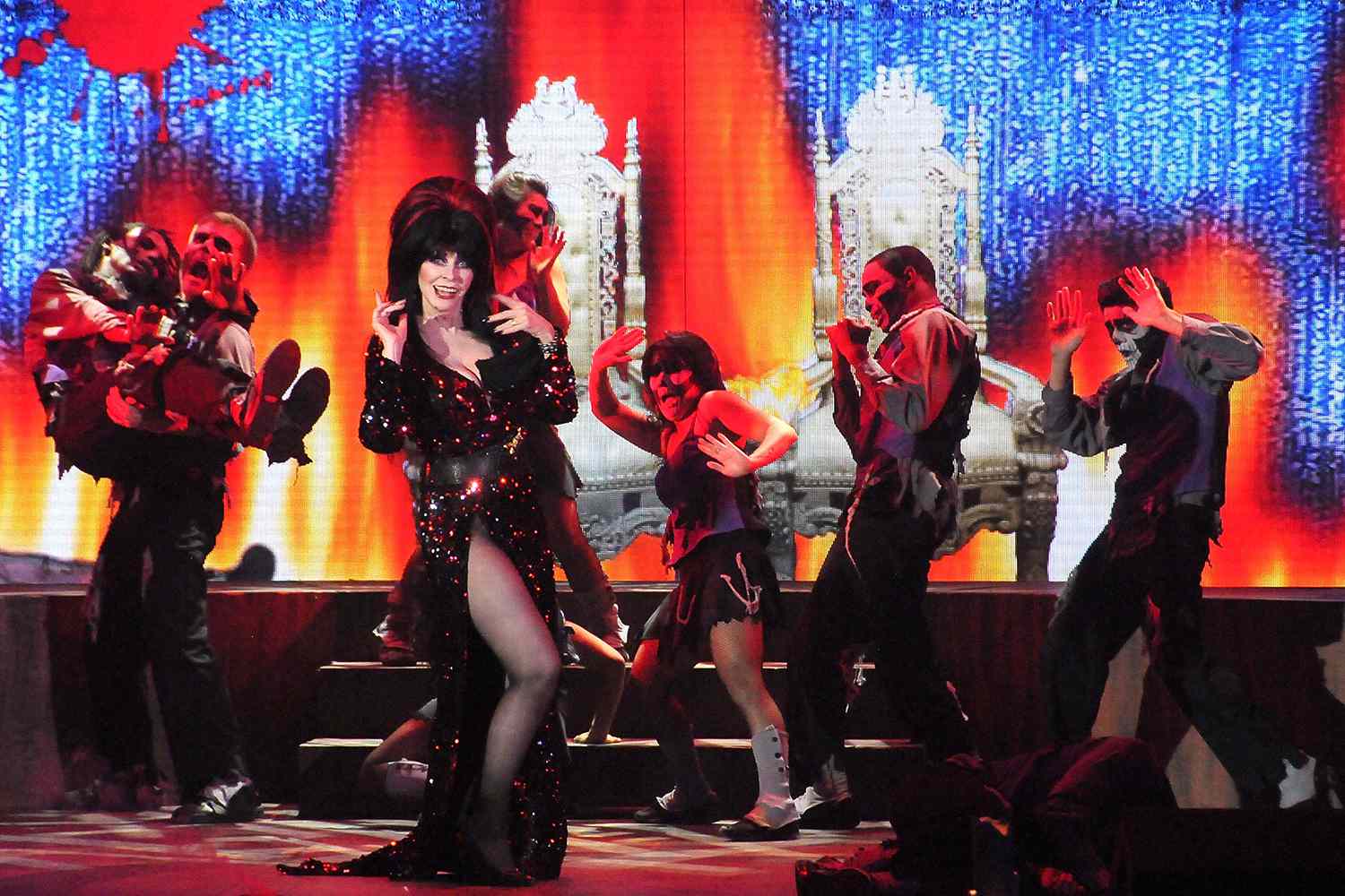 Elvira (aka Cassandra Peterson) performs in her 'Elvira's Sinema Seance' show