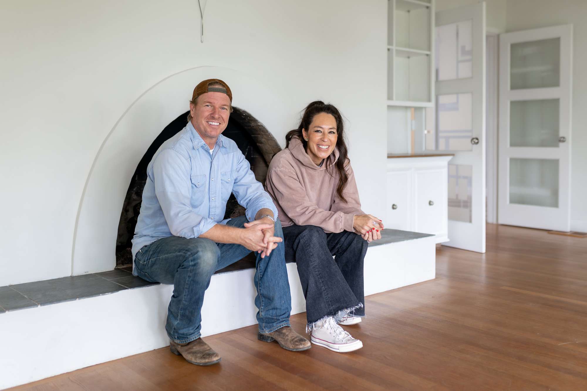 Hosts Chip and Joanna Gaines walk through the Lakehouse, as seen on Fixer Upper: The Lakehouse.