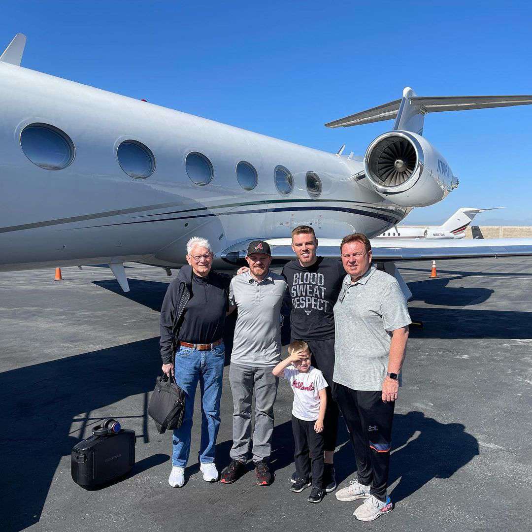 Freddie Freeman with his grandfather, father and son before heading to MLB spring training.