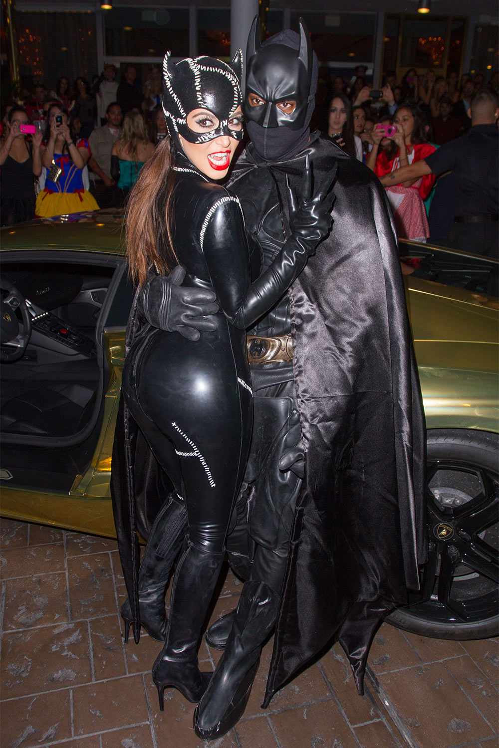 Kim Kardashian and Kanye West arrive at Kim Kardashian's Halloween party at LIV nightclub at Fontainebleau Miami on Oct. 31, 2012