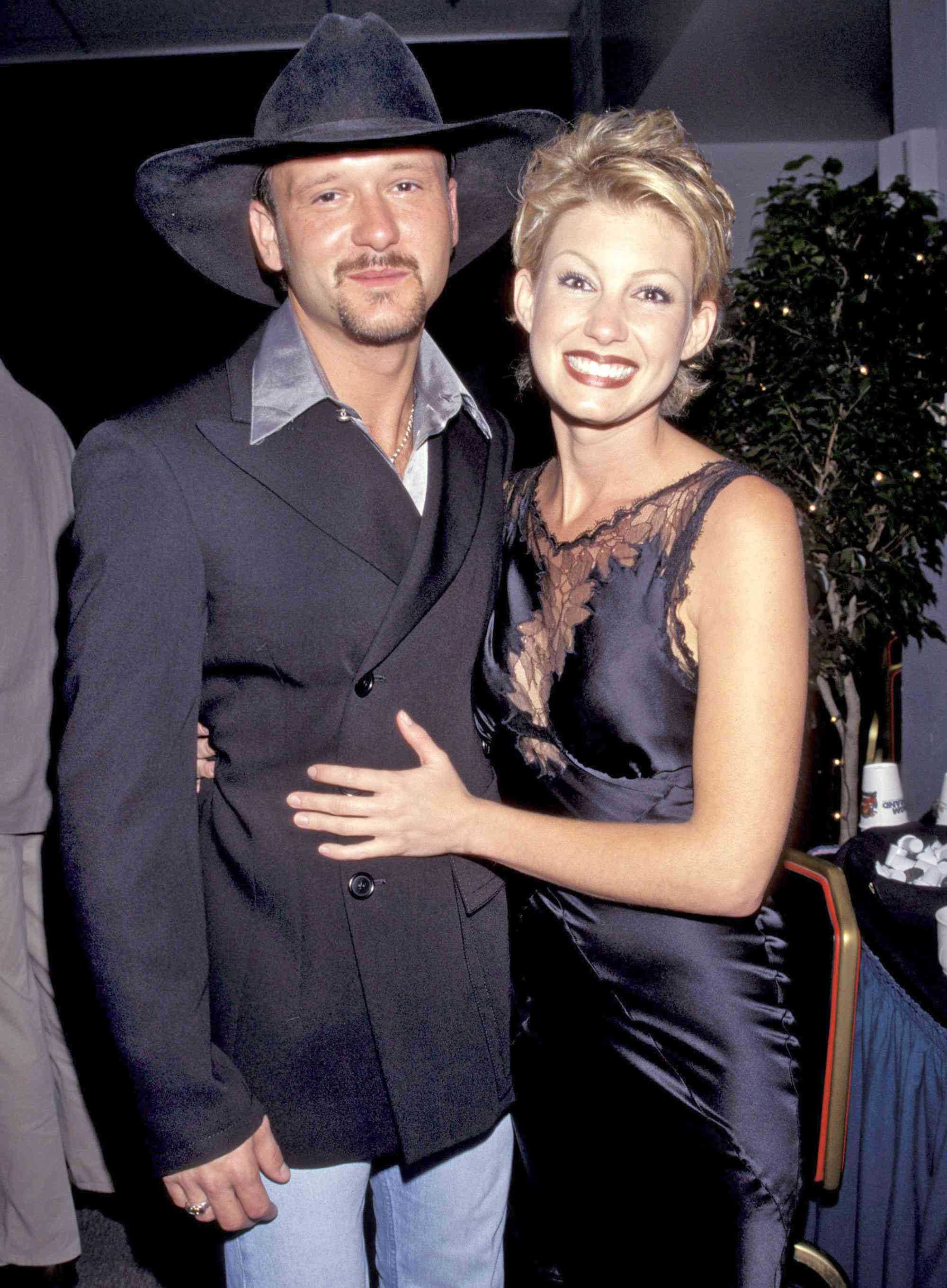 Faith Hill & Tim McGraw (Photo by KMazur/WireImage)