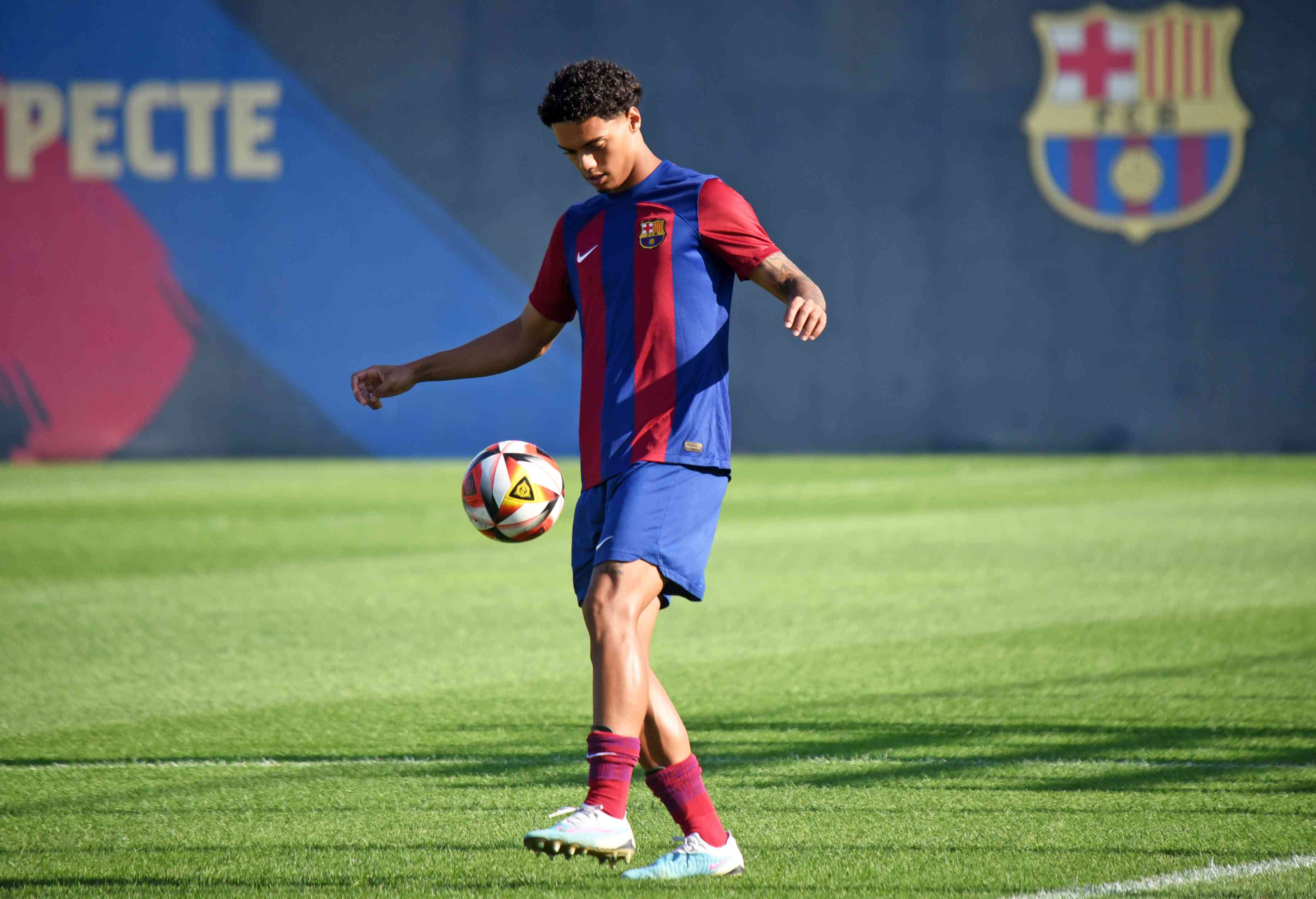 Joao Mendes de Assis Moreira plays soccer with Barcelona FC