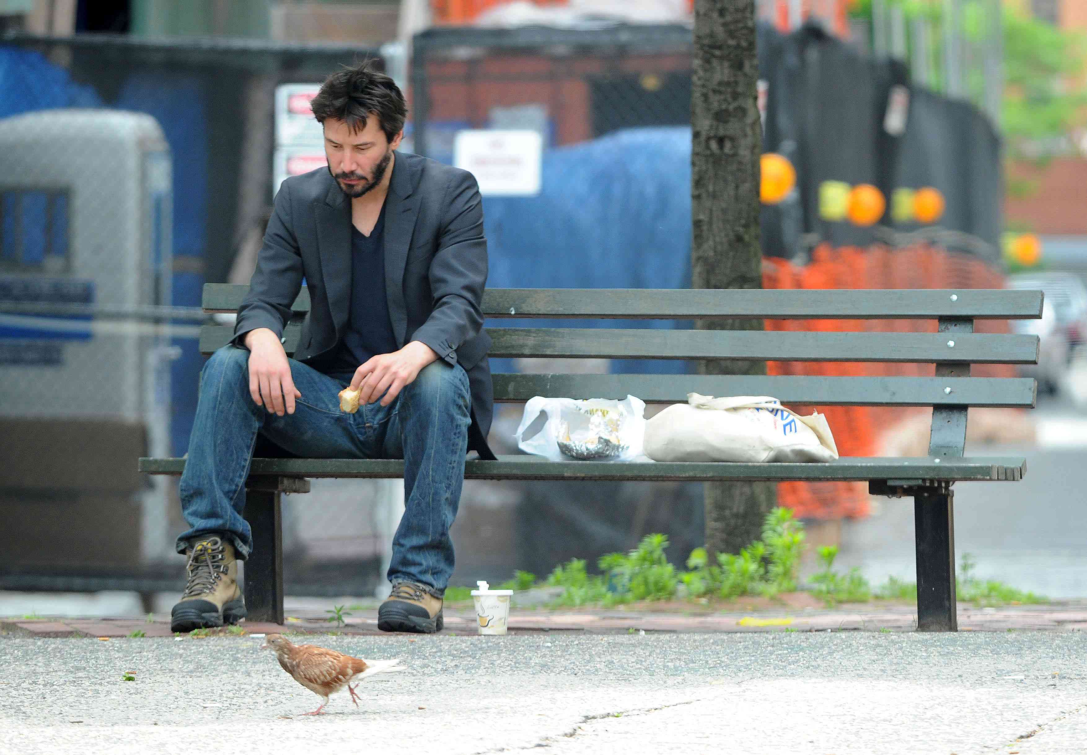 These photos of Keanu Reeves looking downcast on a park bench prompted more than 14,000 people to sign up for a Cheer Up Keanu campaign. The snaps of the actor eating his lunch in New York on May 22 had fans fearing he was depressed. More than 14,000 joined a Facebook group to advertise Cheer Up Keanu Day on June 15 to let Keanu know his movies are appreciated. Reeves's rep issued a statement saying: "Keanu Reeves would like to thank all of his fans for their concerns regarding his happiness and wants to assure everyone that all is well." Photos taken May 2010.