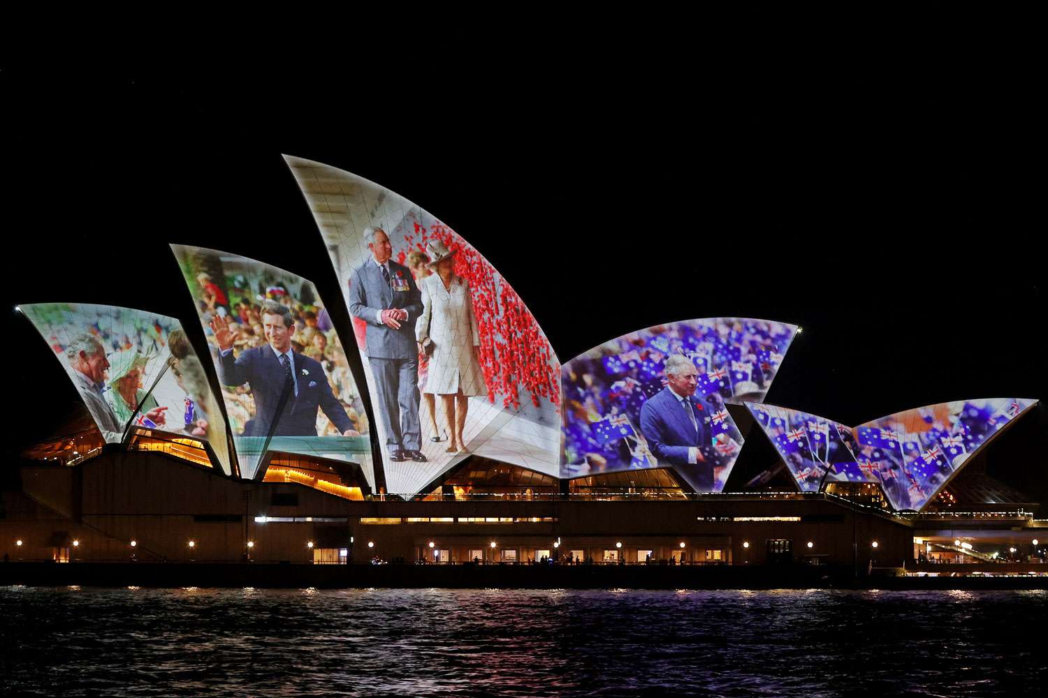 A general view of images from previous royal visits projected onto the Sydney Opera House on October 18, 2024 in Sydney, Australia. The King's visit to Australia will be his first as Monarch, and CHOGM in Samoa will be his first as Head of the Commonwealth