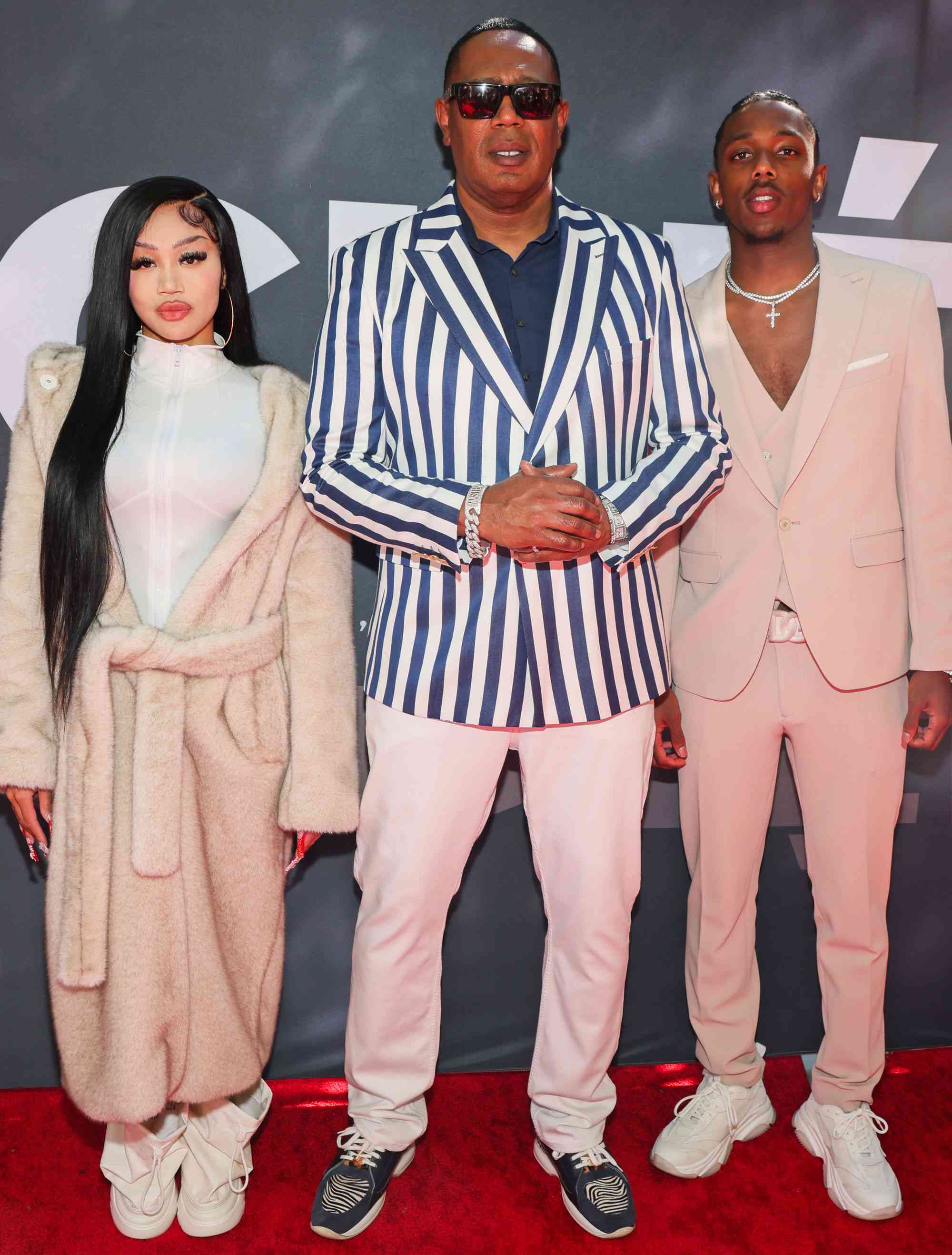 BEVERLY HILLS, CALIFORNIA - MARCH 10: (L-R) Cymphonique Miller, Master P and Hercy Miller attend the Justice For Women International and Children Uniting Nations' 24th Annual Academy Awards Celebration at Warner Bros. Estate on March 10, 2024 in Beverly Hills, California. (Photo by Paul Archuleta/Getty Images)