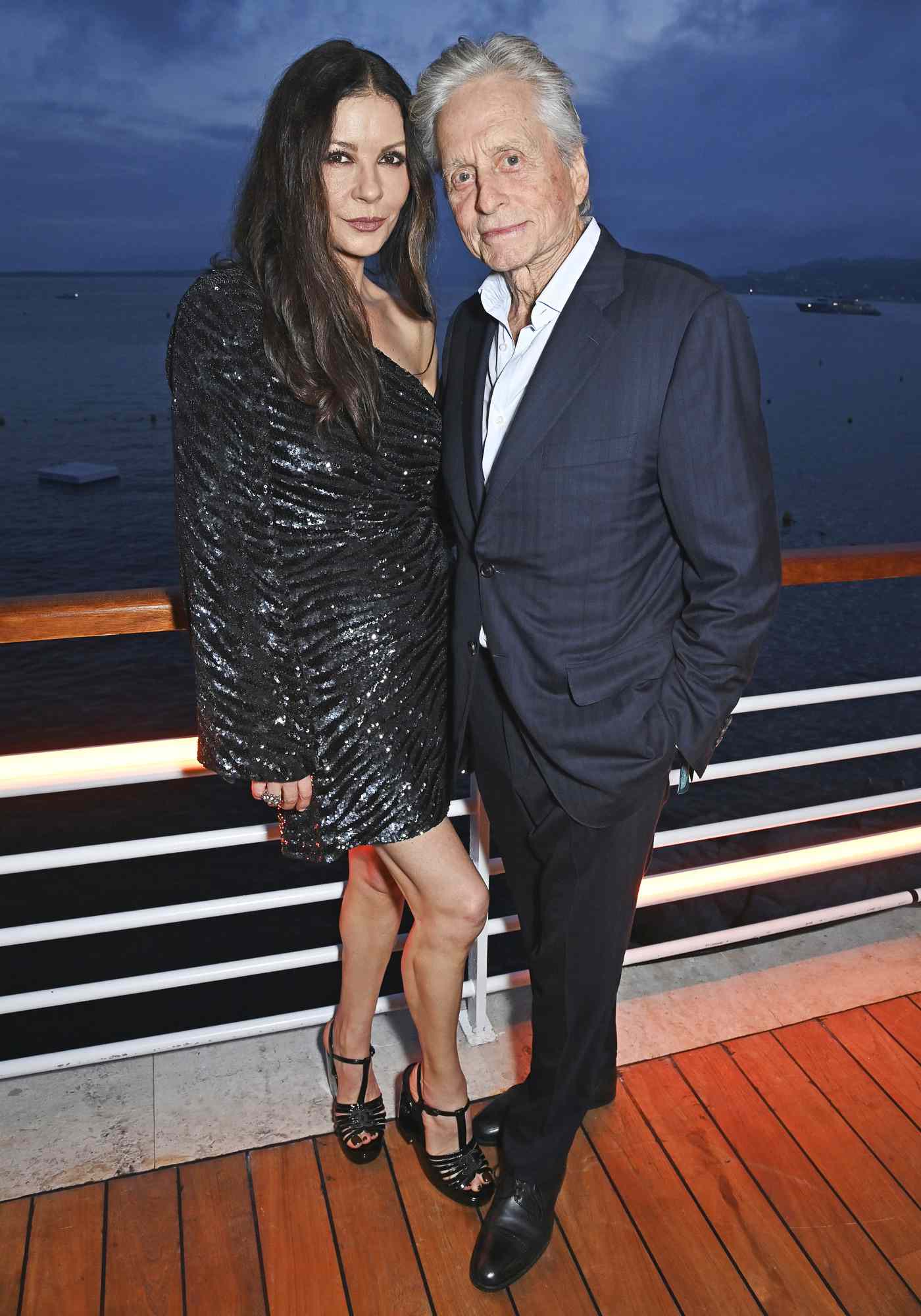 Catherine Zeta-Jones and Michael Douglas attend the launch of the new Aston Martin DB12 at the Hotel du Cap-Eden-Roc in Antibes on May 24, 2023 in Cannes, France