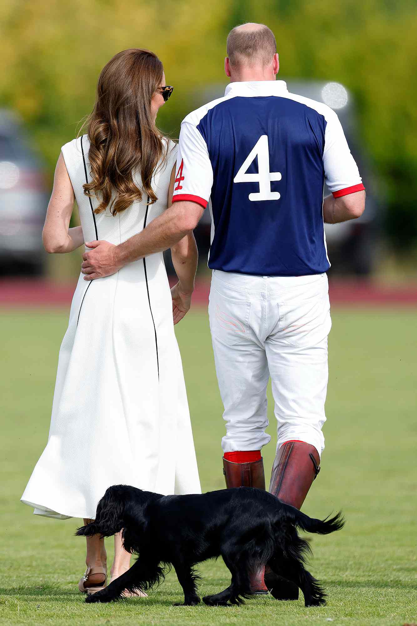 WINDSOR, UNITED KINGDOM - JULY 06: (EMBARGOED FOR PUBLICATION IN UK NEWSPAPERS UNTIL 24 HOURS AFTER CREATE DATE AND TIME) Catherine, Duchess of Cambridge and Prince William, Duke of Cambridge, with their dog 'Orla', attend the Out-Sourcing Inc. Royal Charity Polo Cup at Guards Polo Club, Flemish Farm on July 6, 2022 in Windsor, England