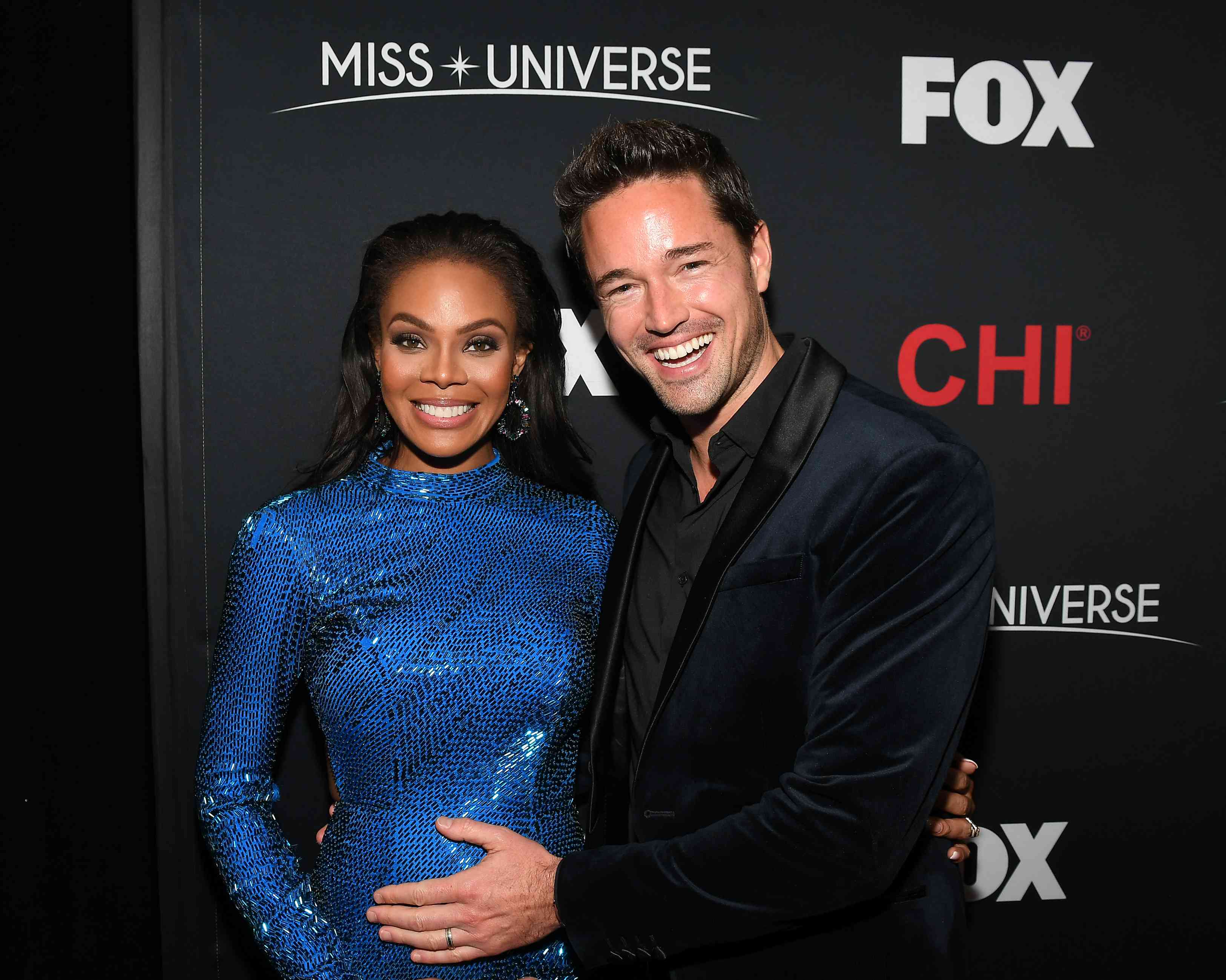 Crystle Stewart and Max Sebrechts attend the 2019 Miss Universe Pageant at Tyler Perry Studios on December 08, 2019 in Atlanta, Georgia. 