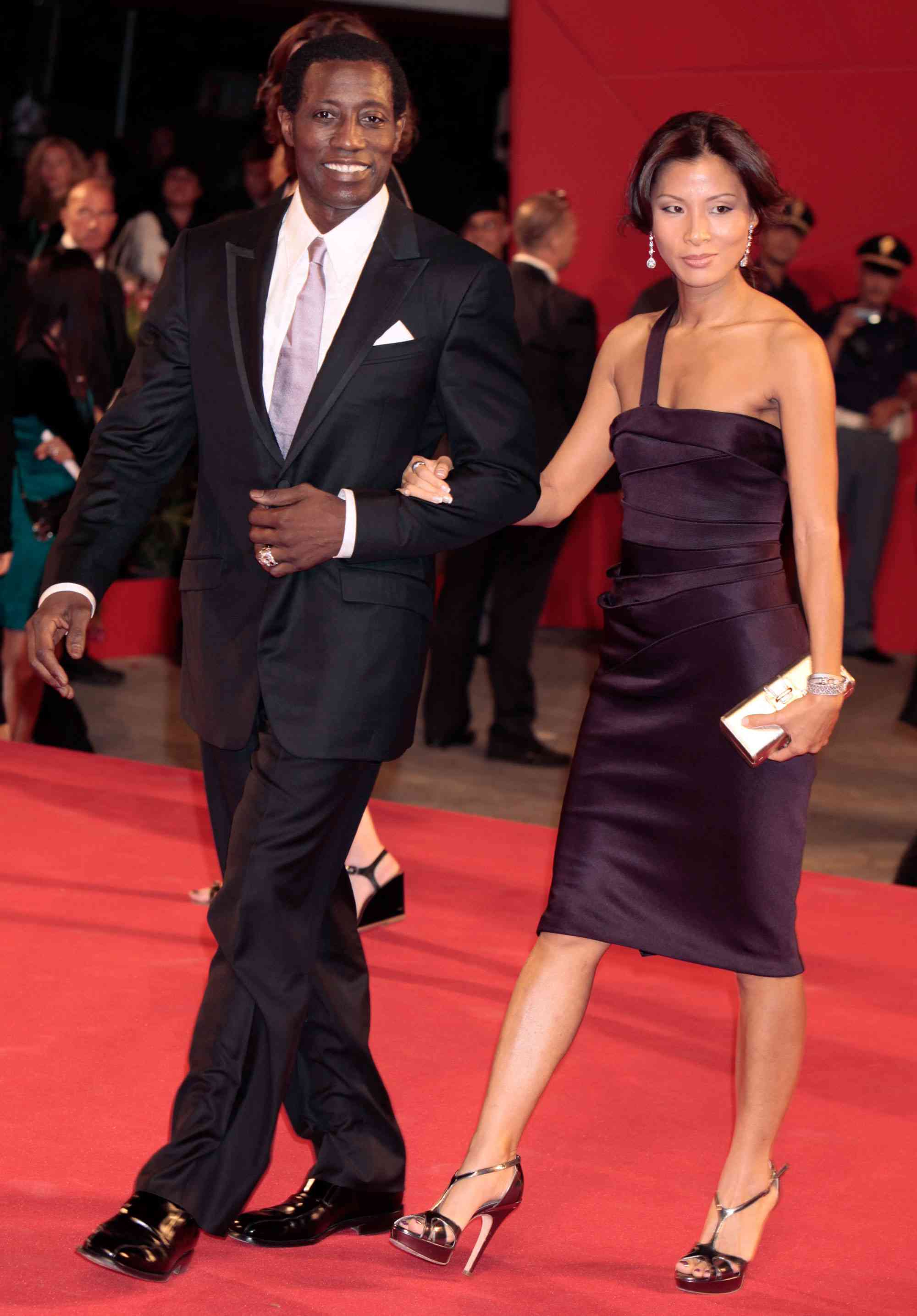 VENICE, ITALY - SEPTEMBER 08: Actor Wesley Snipes and wife Nikki Park attend the "Brooklyn's Finest" premiere at the Sala Grande during the 66th Venice Film Festival on September 8, 2009 in Venice, Italy. (Photo by Elisabetta A. Villa/WireImage)