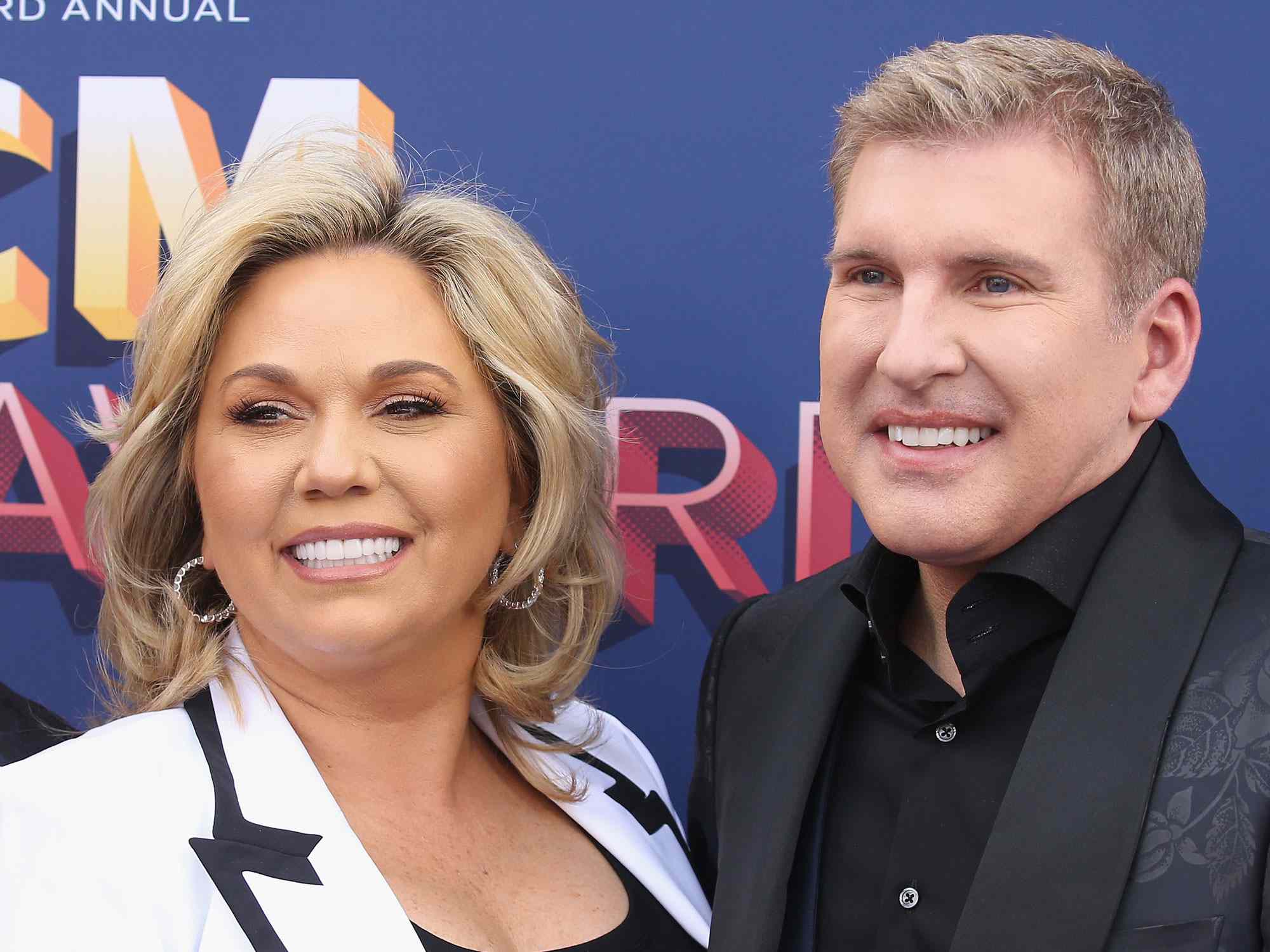 LAS VEGAS, NV - APRIL 15: (L-R) Chase Chrisley, Julie Chrisley, and Todd Chrisley attend the 53rd Academy of Country Music Awards at MGM Grand Garden Arena on April 15, 2018 in Las Vegas, Nevada. (Photo by Michael Tran/FilmMagic)