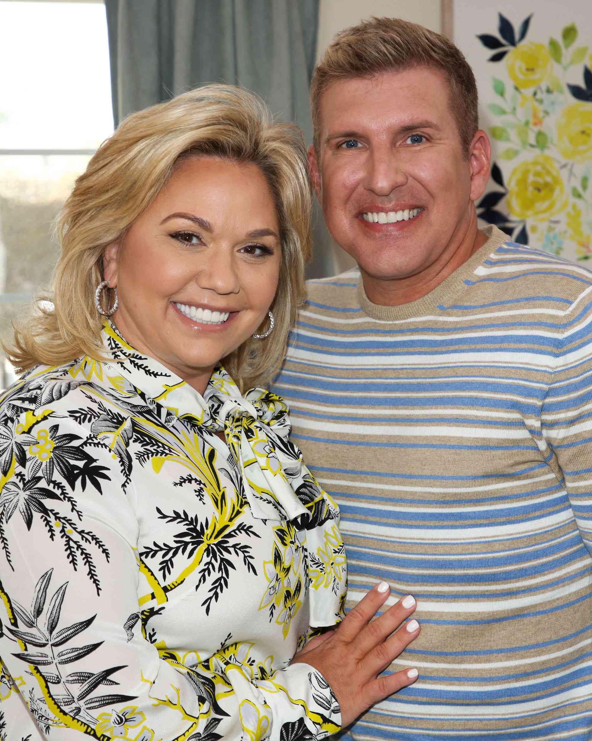 UNIVERSAL CITY, CA - JUNE 18: Reality TV Personalities Julie Chrisley (L) and Todd Chrisley (R) visit Hallmark's "Home & Family" at Universal Studios Hollywood on June 18, 2018 in Universal City, California. (Photo by Paul Archuleta/Getty Images)