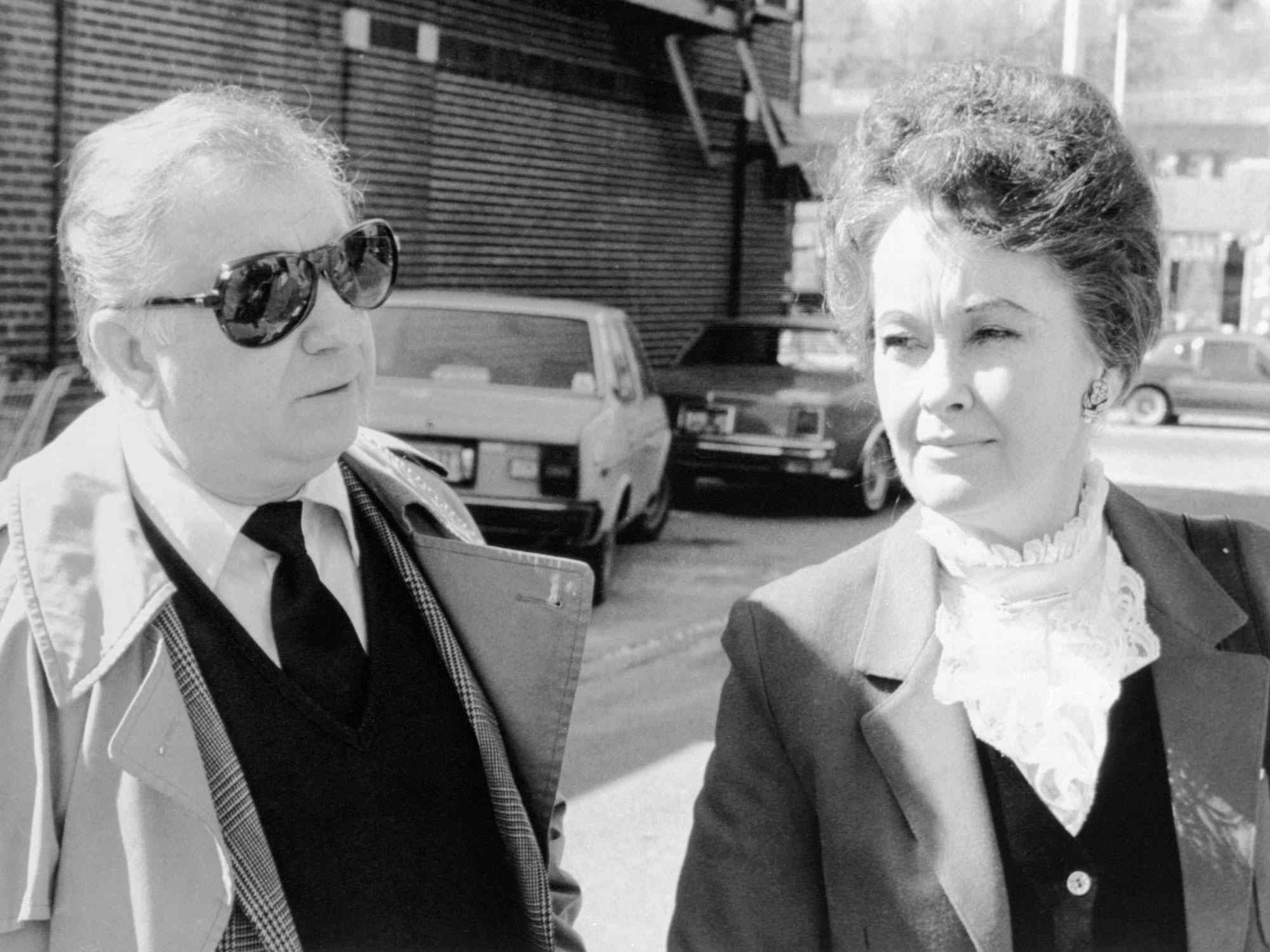 (Original Caption) Ed and Lorraine Warren arrives at Danbury Superior Court, March 19, 1981, where a grand jury returned an indictment against Arne Cheyenne Johnson in the slaying of Alan Bono, 40, on February 16, 1981, in Broofield, Connecticut. Lorraine Warren was one of the persons to talk with the 19 year old man after the slaying which his attorney says was the work of the devil.