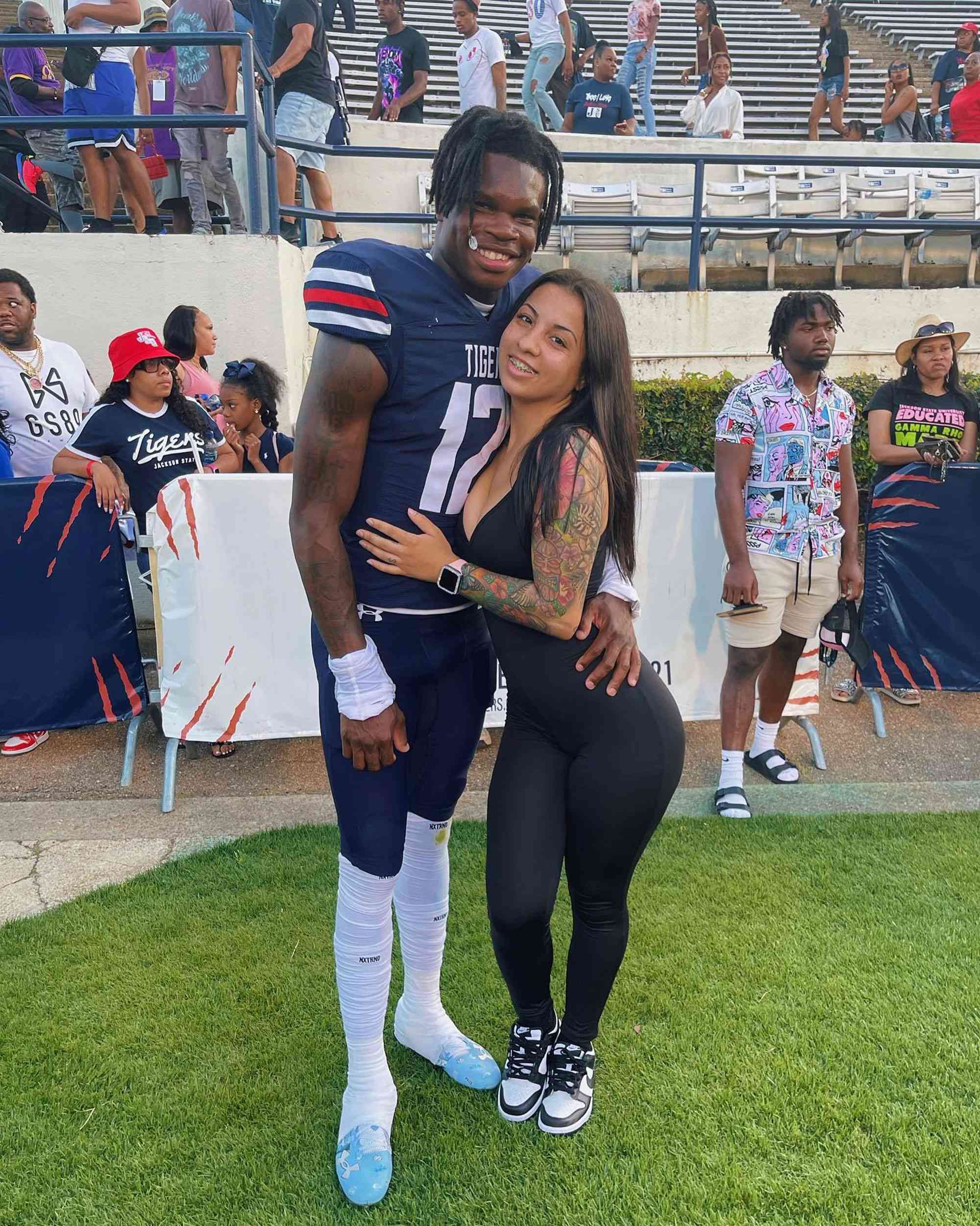 Travis Hunter with his fiancée, Leanna Lanee.