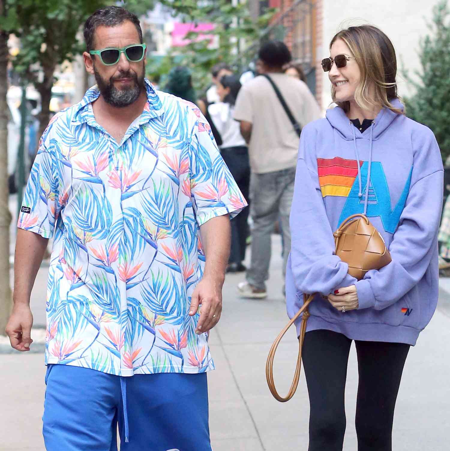 Adam Sandler and his wife, Jackie, were spotted returning to the Crosby Hotel after an afternoon of shopping in Soho, New York City. 